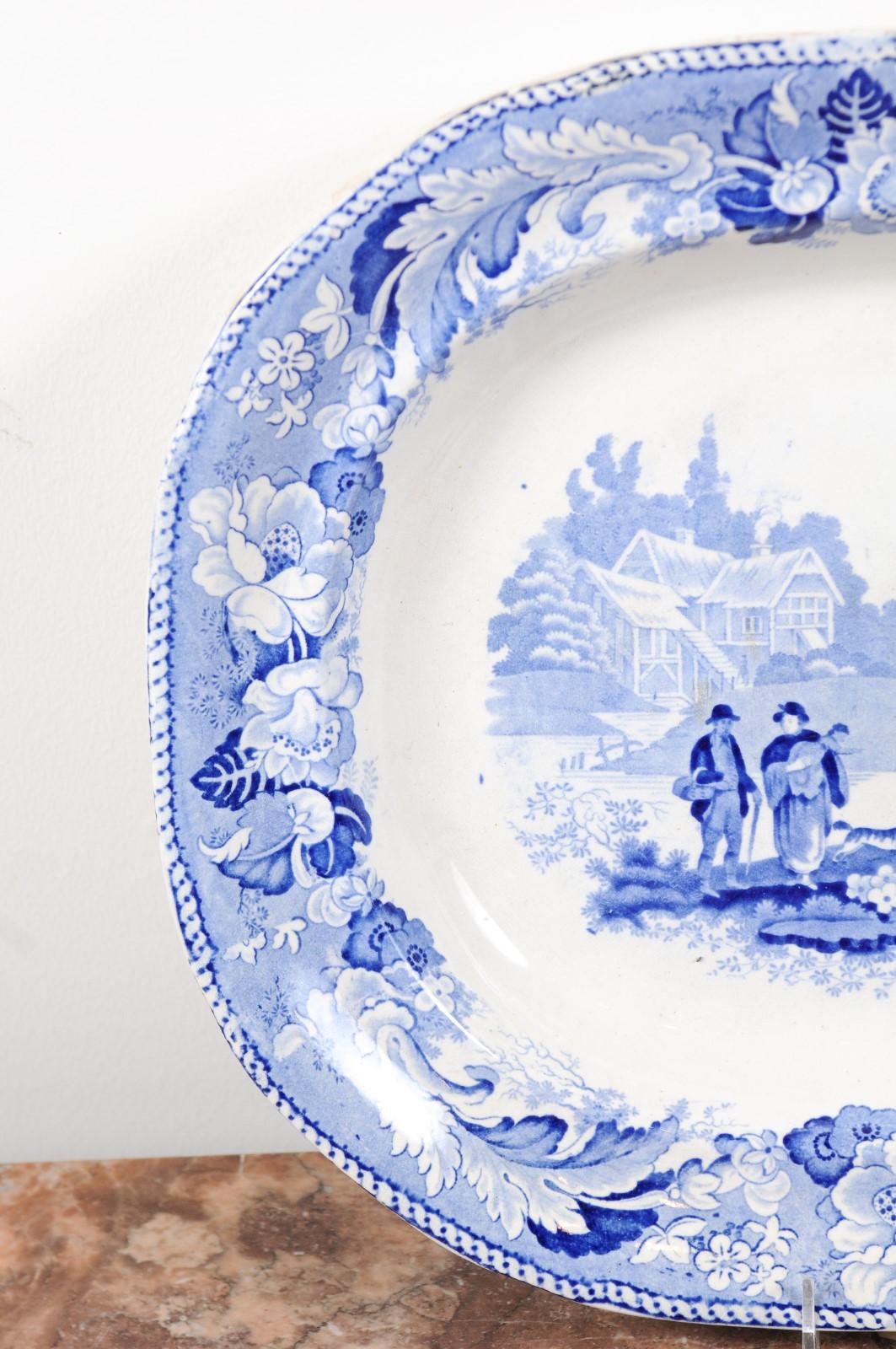 Earthenware English 19th Century Blue and White Platter with Pastoral Scene and Floral Décor