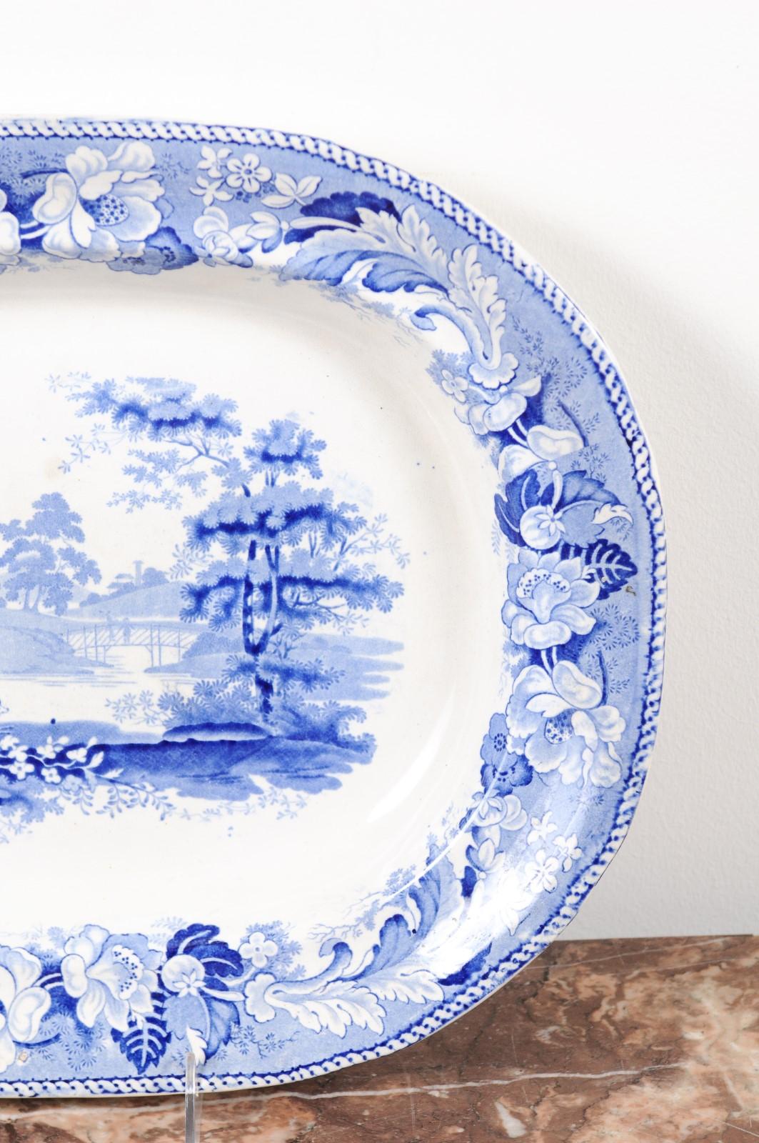 English 19th Century Blue and White Platter with Pastoral Scene and Floral Décor 1