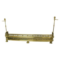 English 19th Century Brass Pierced Footed Fender with Removable Tool Holders English 19th Century Brass Pierced Footed Fender with Removable Tool Holders