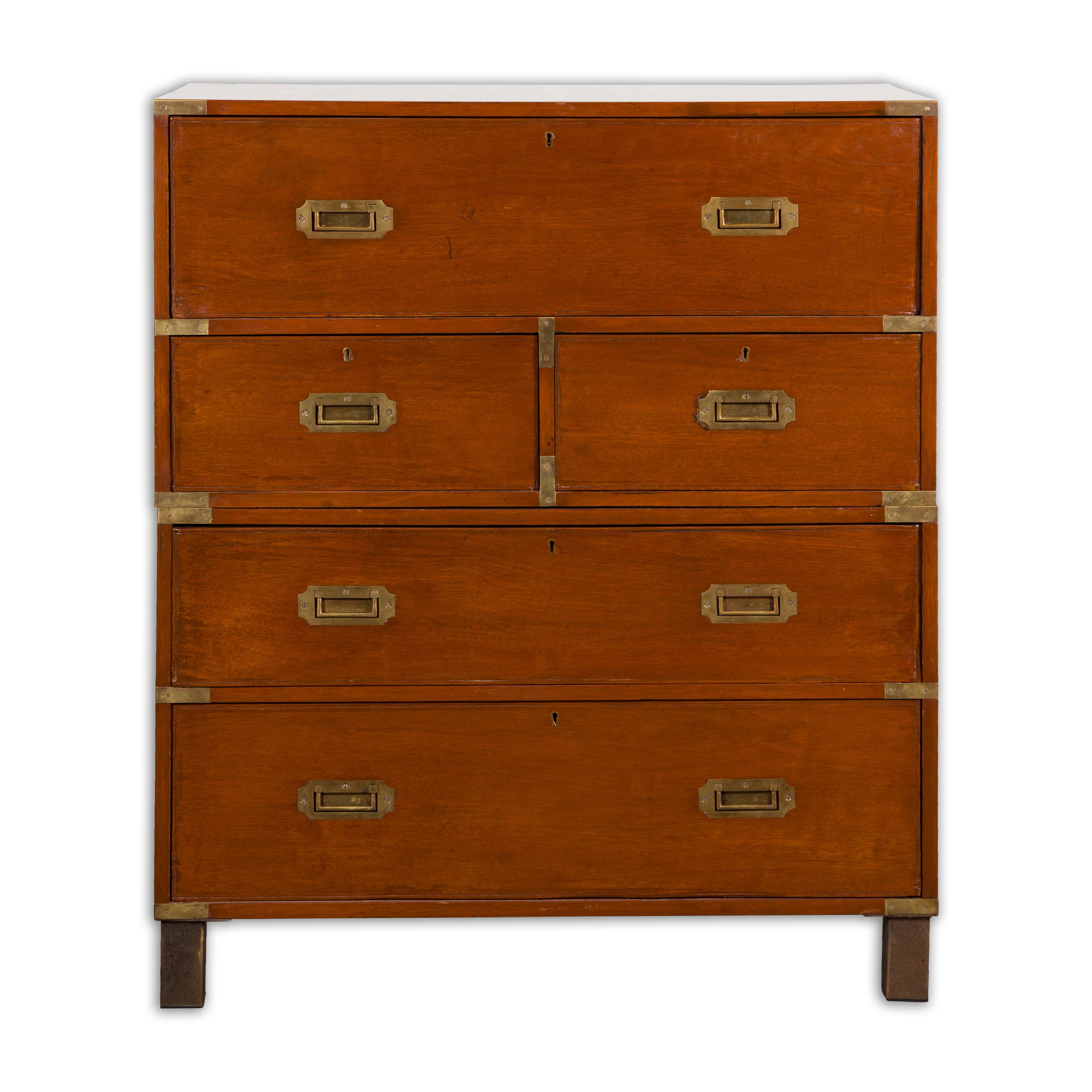 An English Campaign chest from the 19th century, with drop front desk, four drawers and brass hardware. Add a touch of antique charm to your home with this English Campaign two-part chest from the 19th century. Crafted in England, this chest