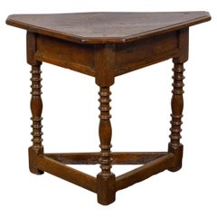 Antique English 19th Century Dark Oak Triangular Demilune Table with Turned Legs