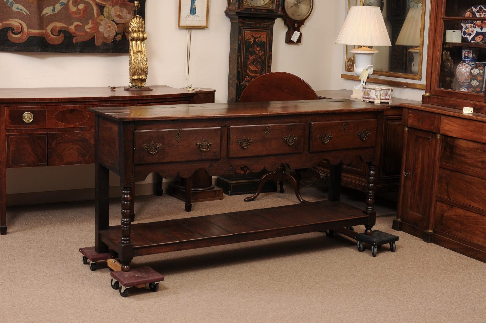 English 19th Century Dresser Base in oak with 3 Drawers, Turned Legs and Pot Board Below