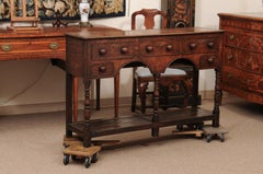 English 19th Century Dresser Base with 5 Drawers, Arched Apron, Turned Supports