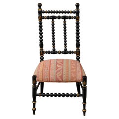 English 19th Century Ebonized Wood Bobbin Child's Chair with Woven Upholstery