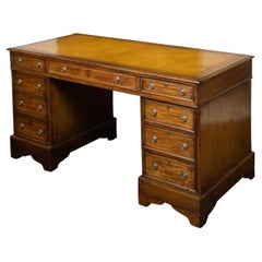English 19th Century Elmwood Kneehole Desk with Leather Top and Nine Drawers