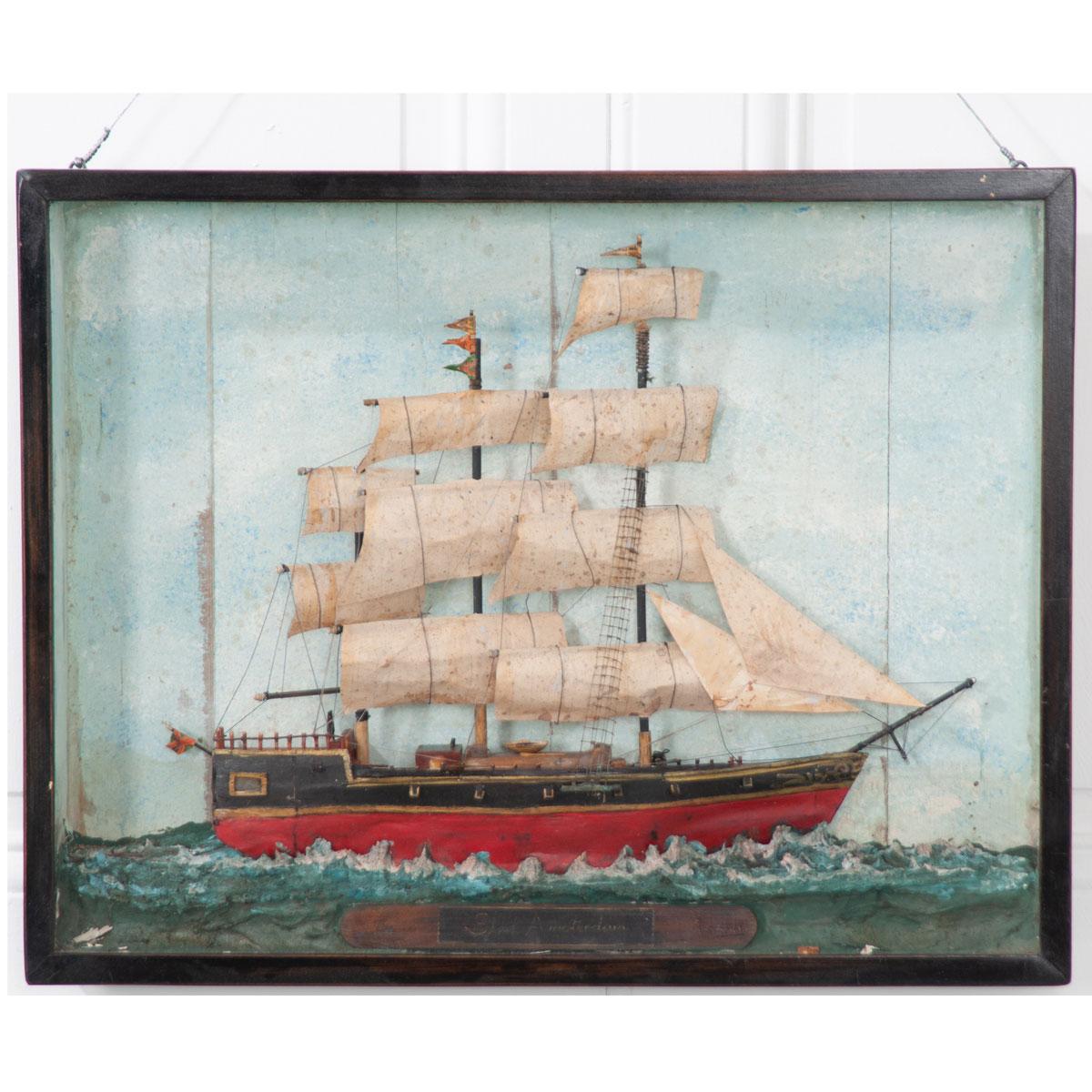 A brilliant English, 19th century nautically themed diorama featuring the ‘Stad Amsterdam’ clipper in an ebonized wood, framed box. These three-dimensional works of art were typically made by sailors. Note the meticulously detailed sails, masts,