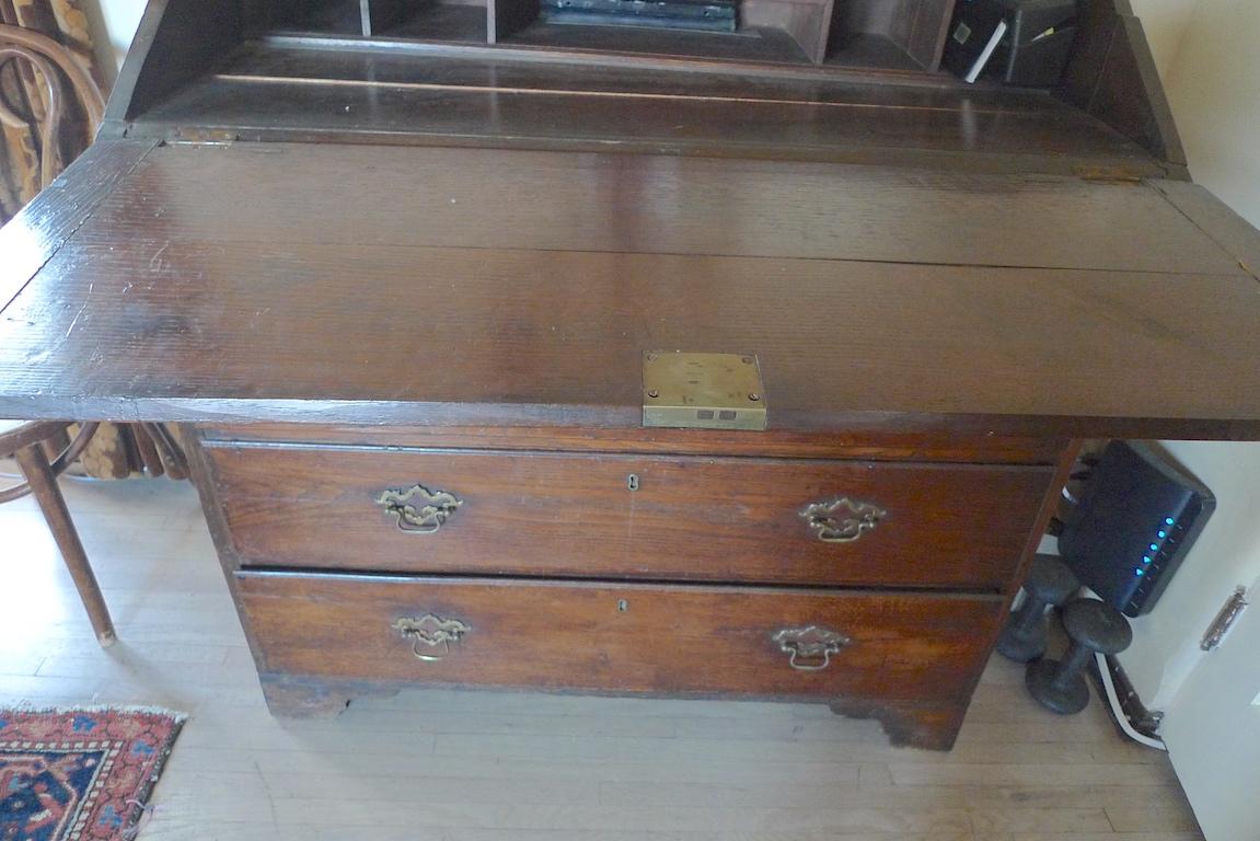 Stained English 19th Century Georgian Chest of 5 Drawers with Drop Panel Desk Top For Sale