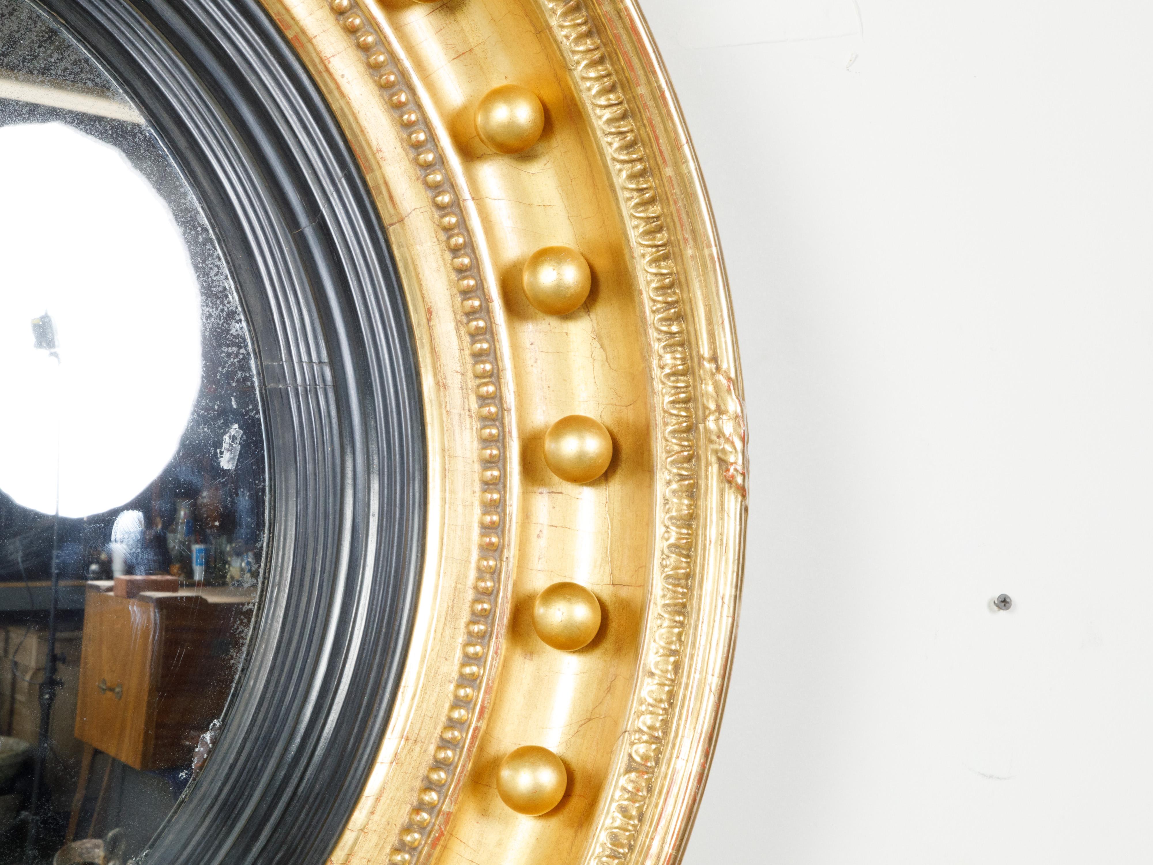 English 19th Century Giltwood Convex Girandole Bullseye Mirror with Eagle Motif For Sale 3