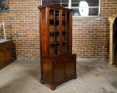 English 19th Century Mahogany Bookcase with Glass Doors and Carved Rosettes