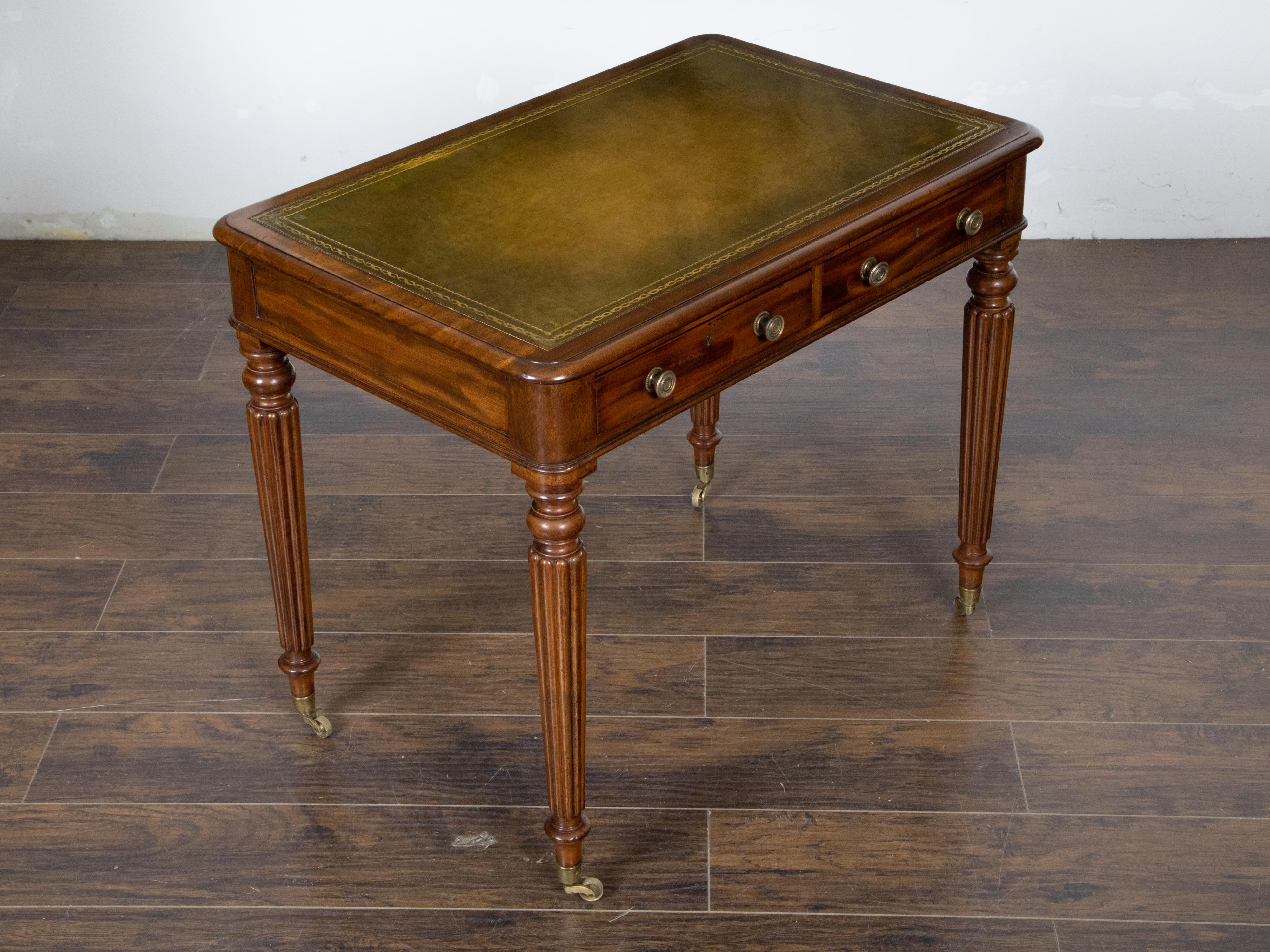 Carved English 19th Century Mahogany Desk with Green Leather Top and Reeded Legs For Sale