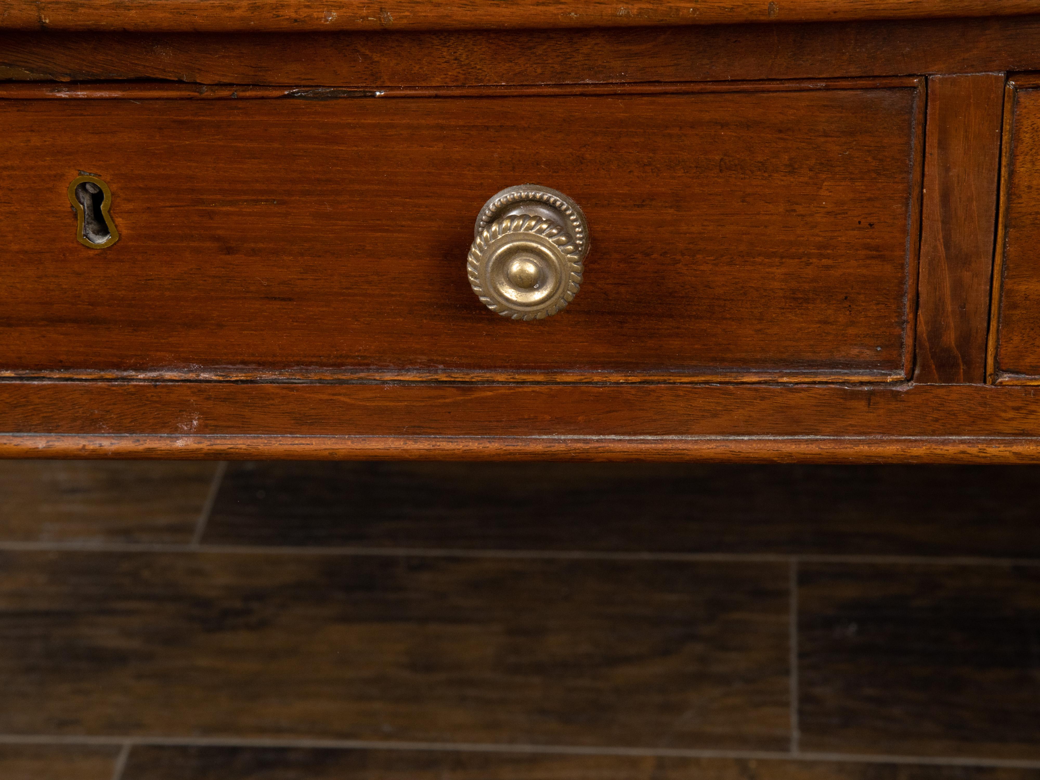 English 19th Century Mahogany Desk with Three Drawers, Mounted on Brass Casters 4