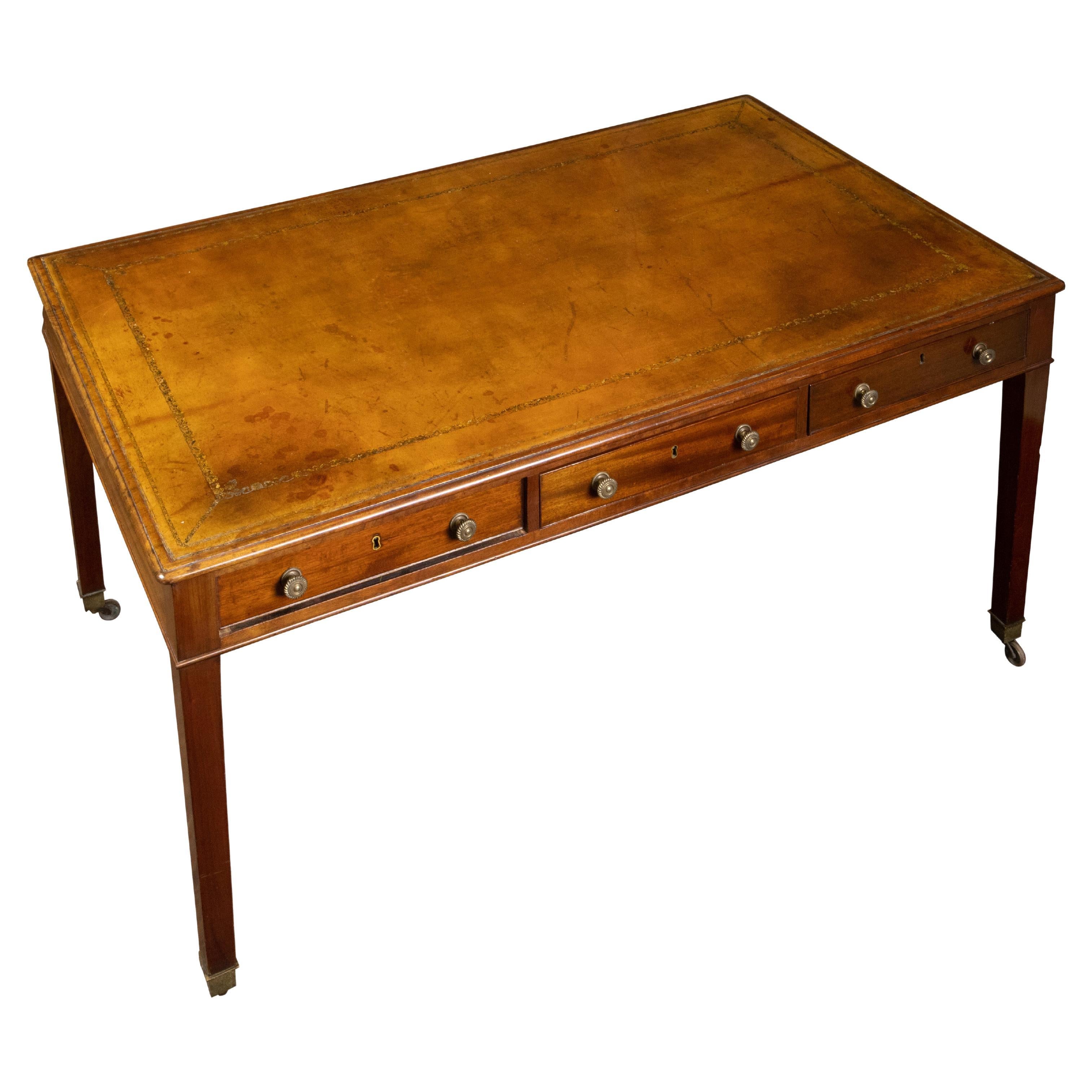 English 19th Century Mahogany Desk with Three Drawers, Mounted on Brass Casters