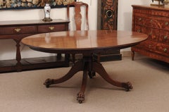 English 19th Century Mahogany Oval Dining Table with Pedestal Base and Paw Feet