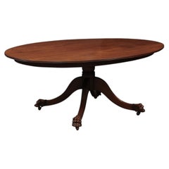 English 19th Century Mahogany Oval Dining Table with Pedestal Base and Paw Feet