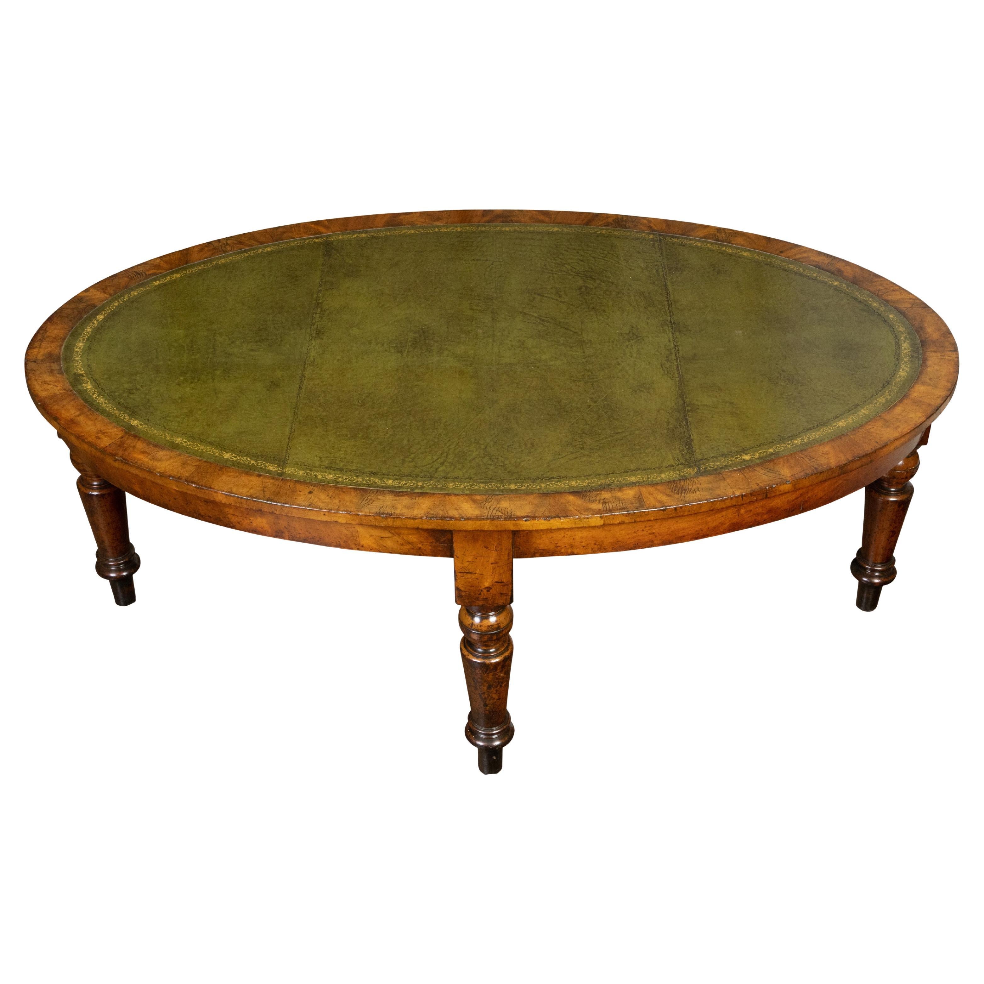 English 19th Century Mahogany Table with Green Leather Oval Top and Turned Legs