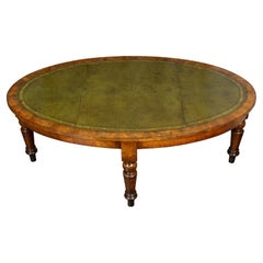 Antique English 19th Century Mahogany Table with Green Leather Oval Top and Turned Legs