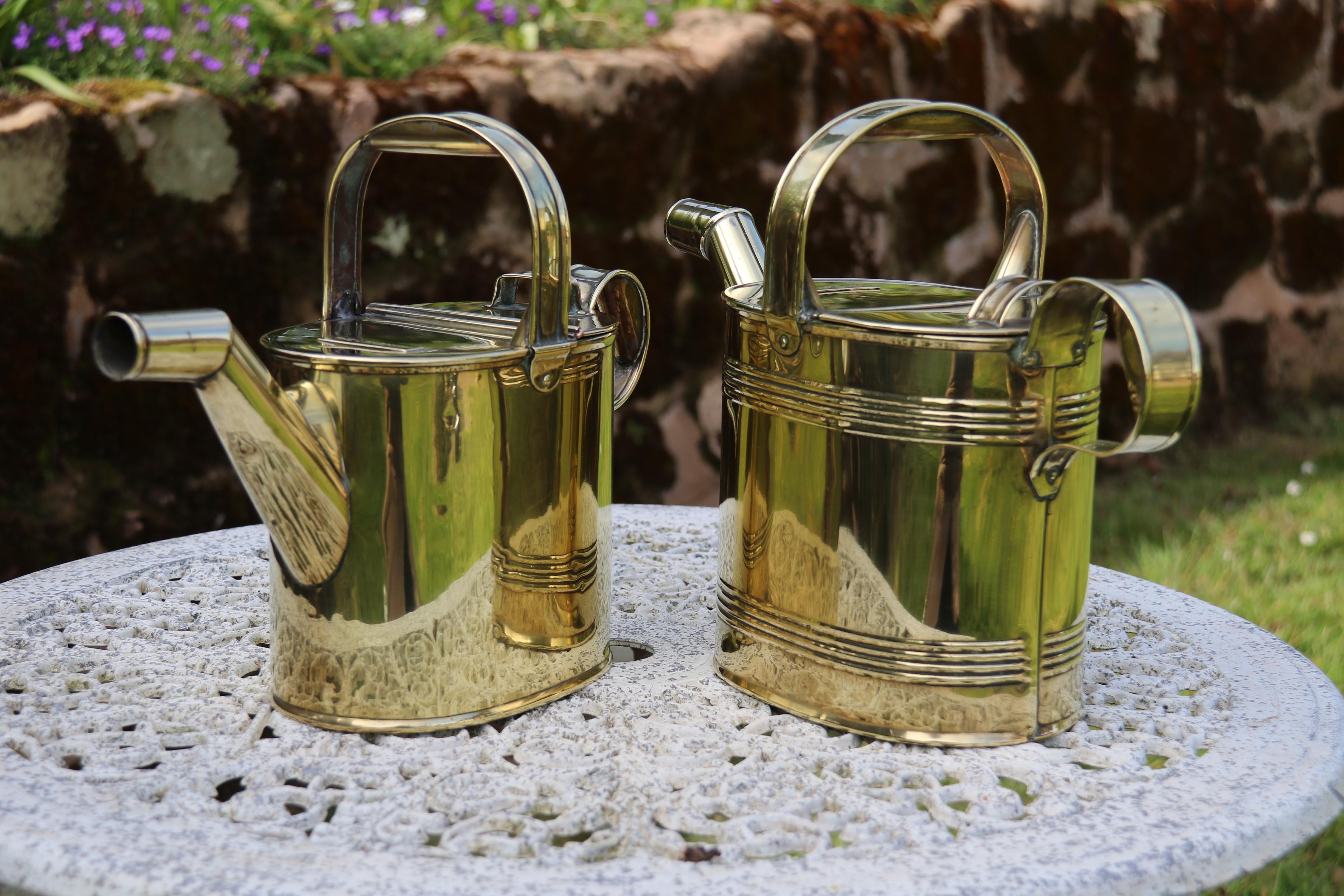 Brass English 19th century matched pair of brass watering cans from a London Hotel For Sale