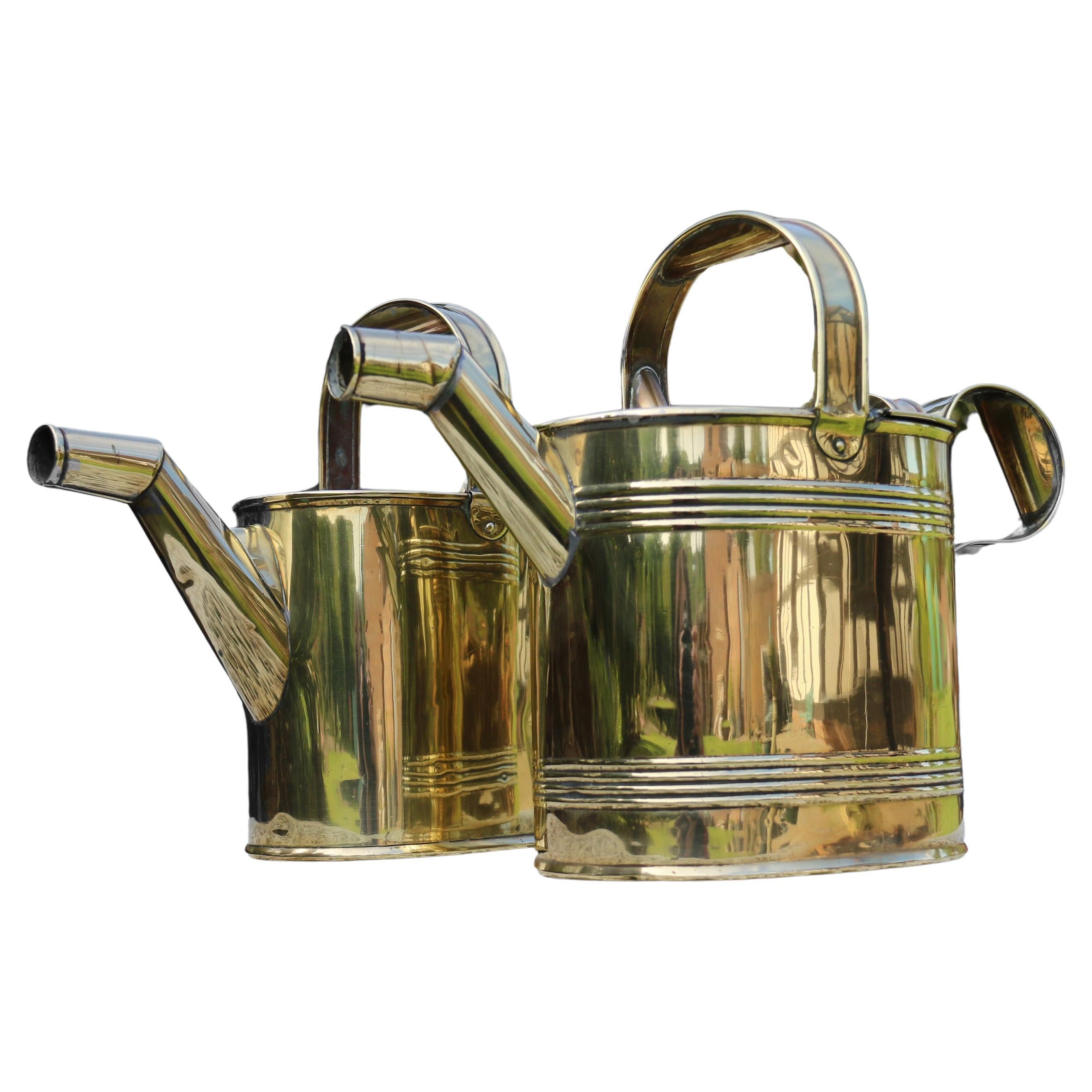 English 19th century matched pair of brass watering cans from a London Hotel For Sale