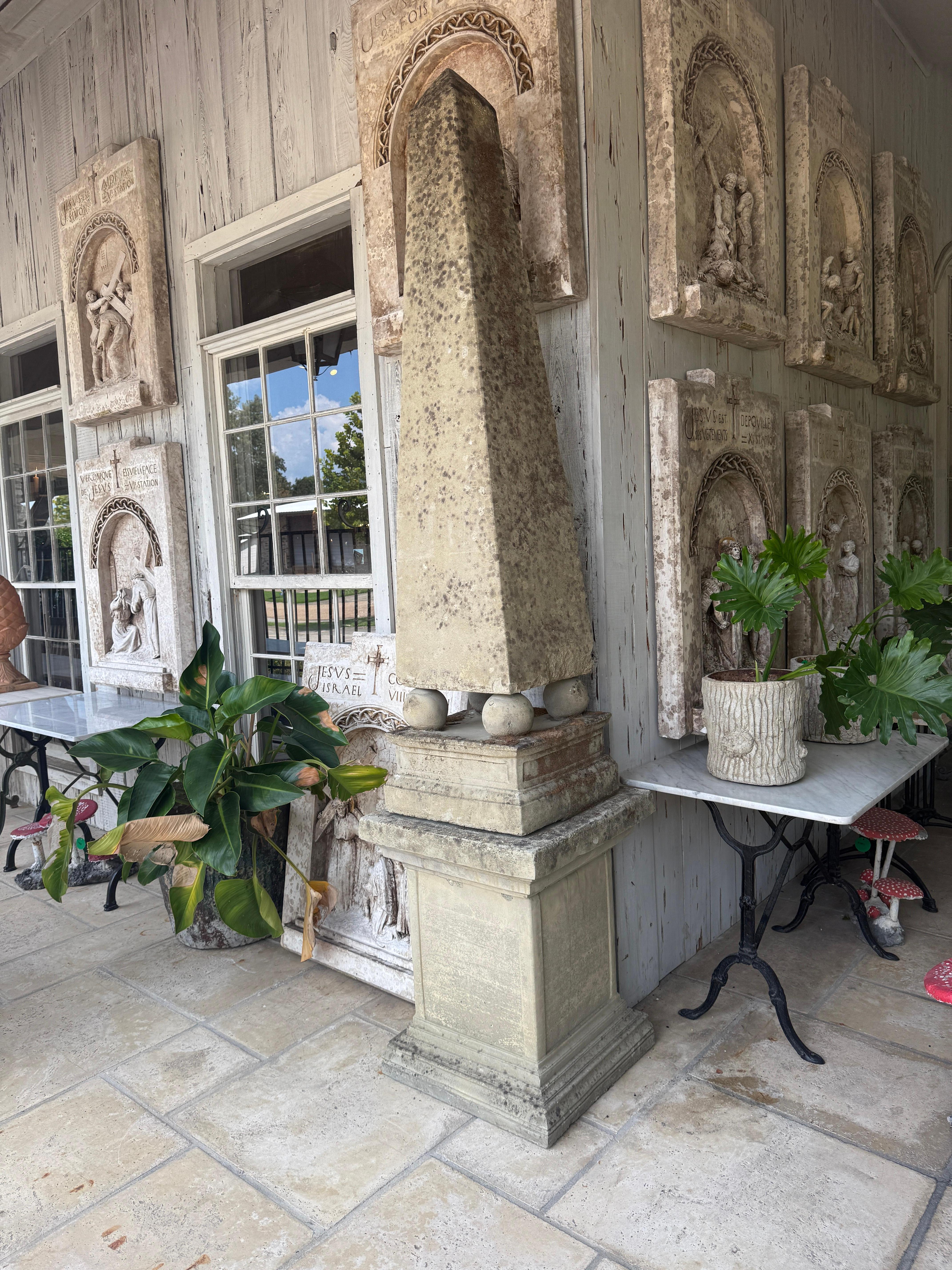 A classically styled obelisk, with monumental scale, for your garden or outdoor space. This exceptional obelisk was made in England, circa 1880. Obelisks date back to ancient Egyptian, then Greek cultures. They were historically monolithic, however,