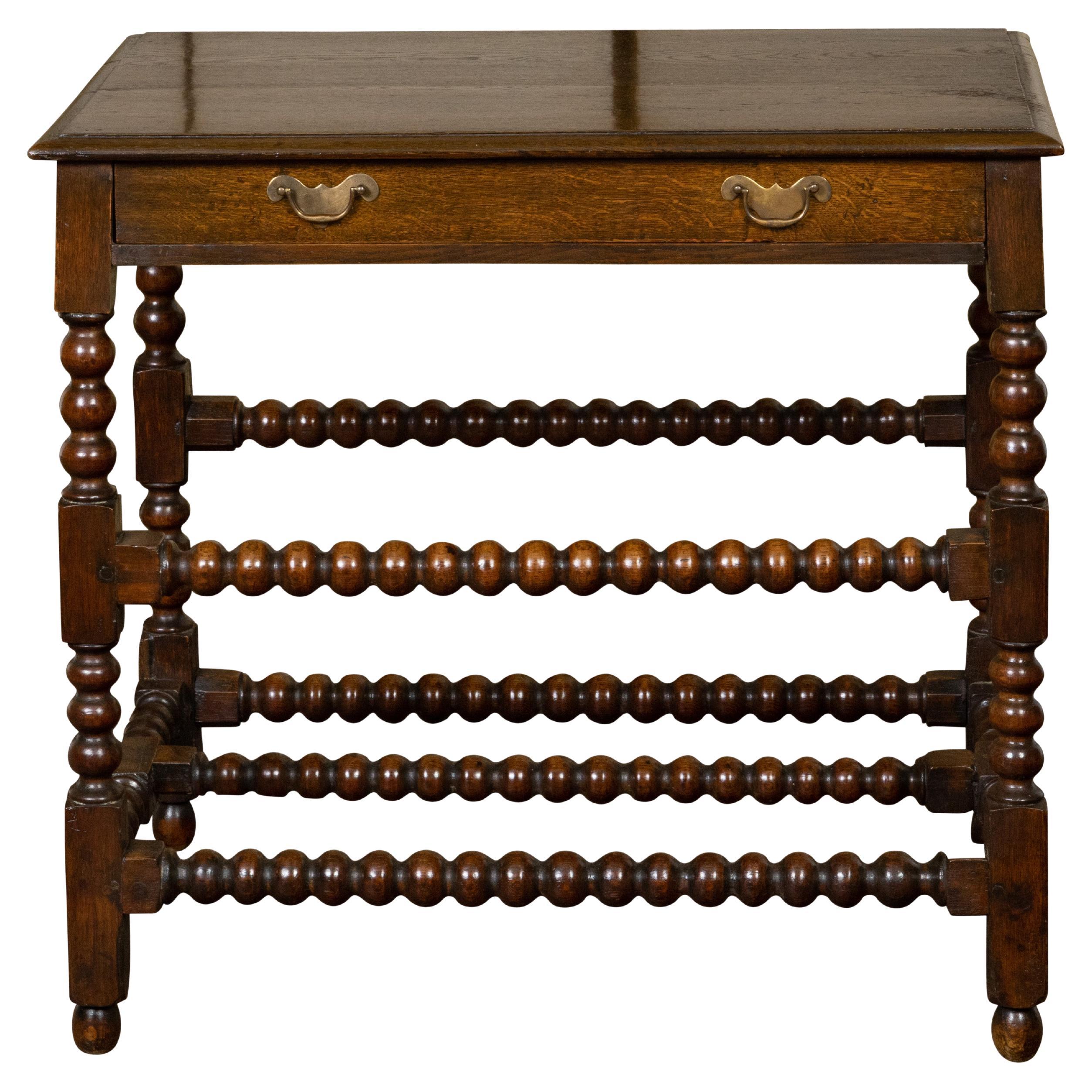 English 19th Century Oak Bobbin Leg Table with Single Drawer and Cross Stretcher For Sale