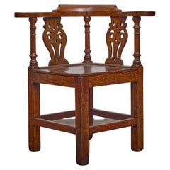 English 19th Century Oak Corner Chair with Carved Back Splats