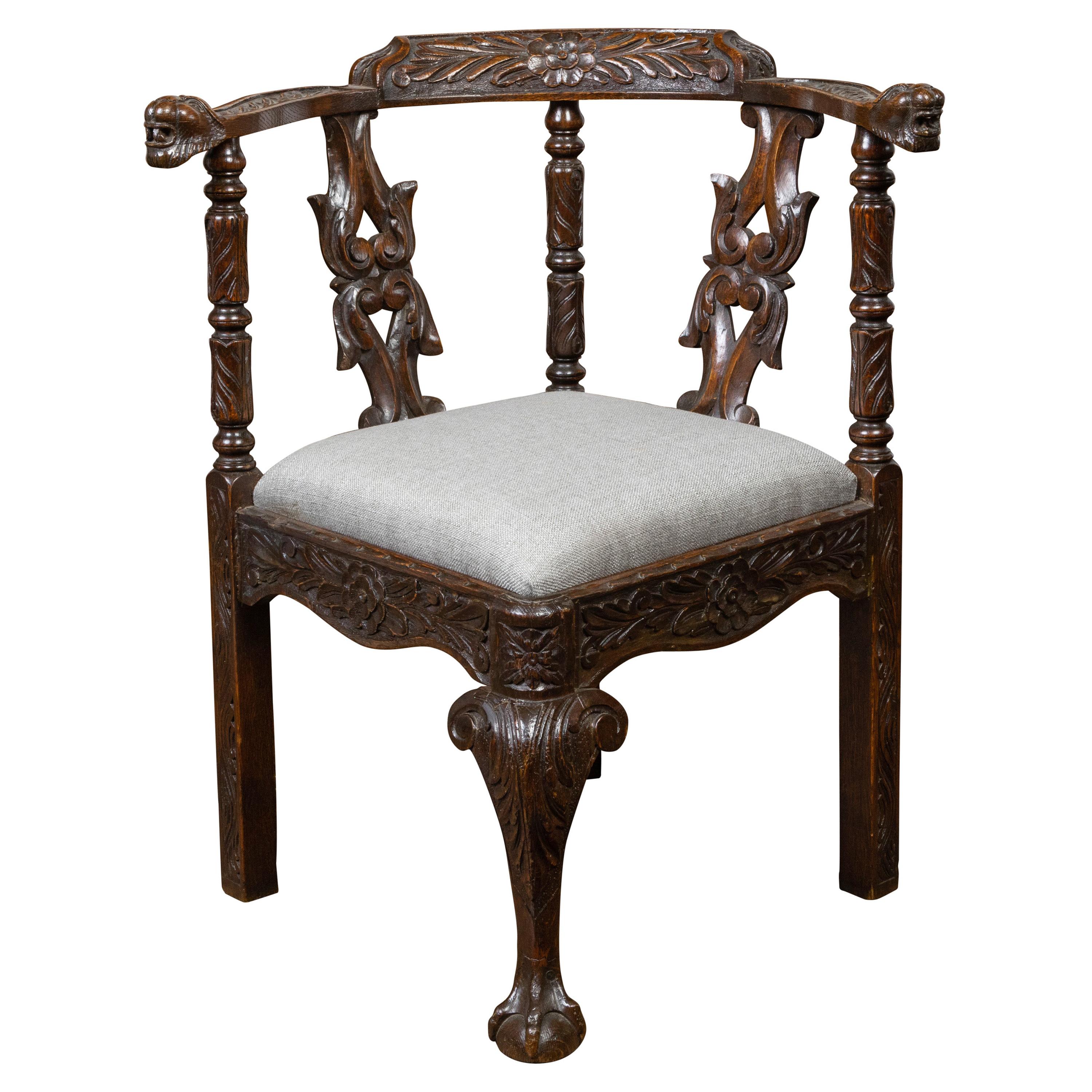 English 19th Century Oak Corner Chair with Carved Foliage and New Upholstery