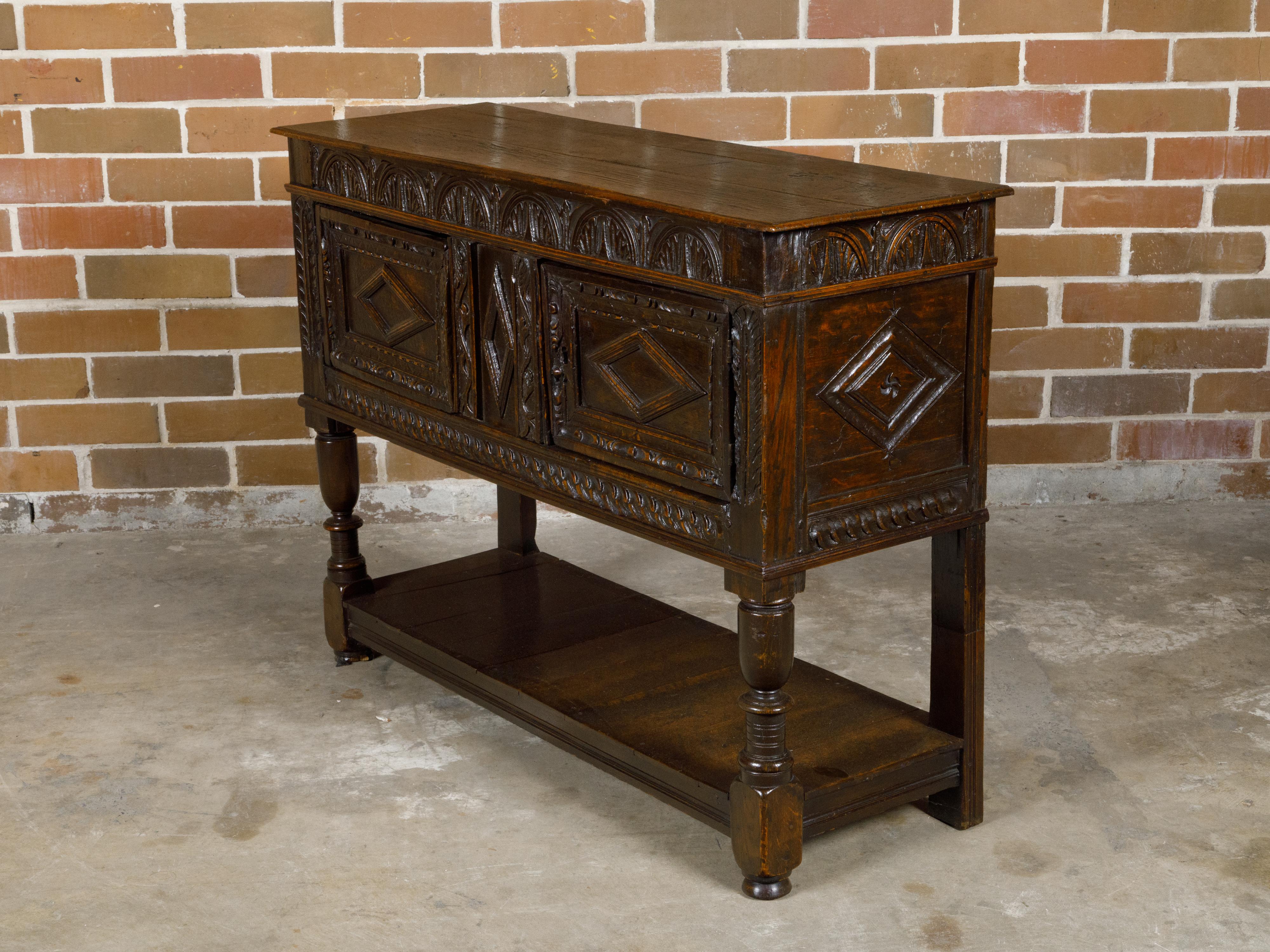 English 19th Century Oak Cupboard with Carved Décor, Two Doors and Low Shelf For Sale 14