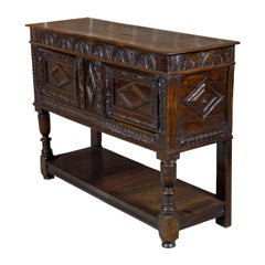 English 19th Century Oak Cupboard with Carved Décor, Two Doors and Low Shelf