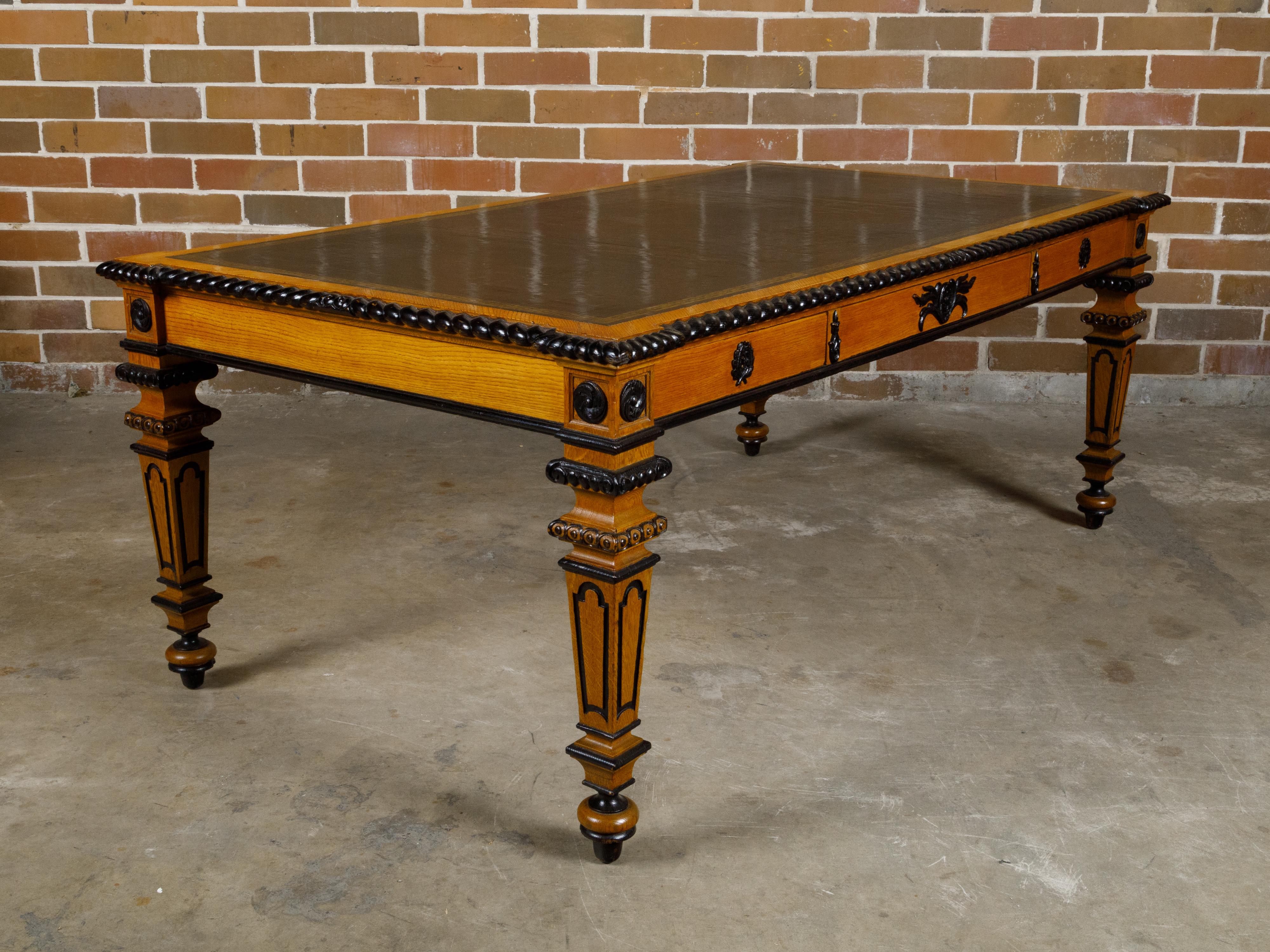 English 19th Century Oak Desk with Ebonized Accents and Gilded Greek Key Frieze For Sale 15