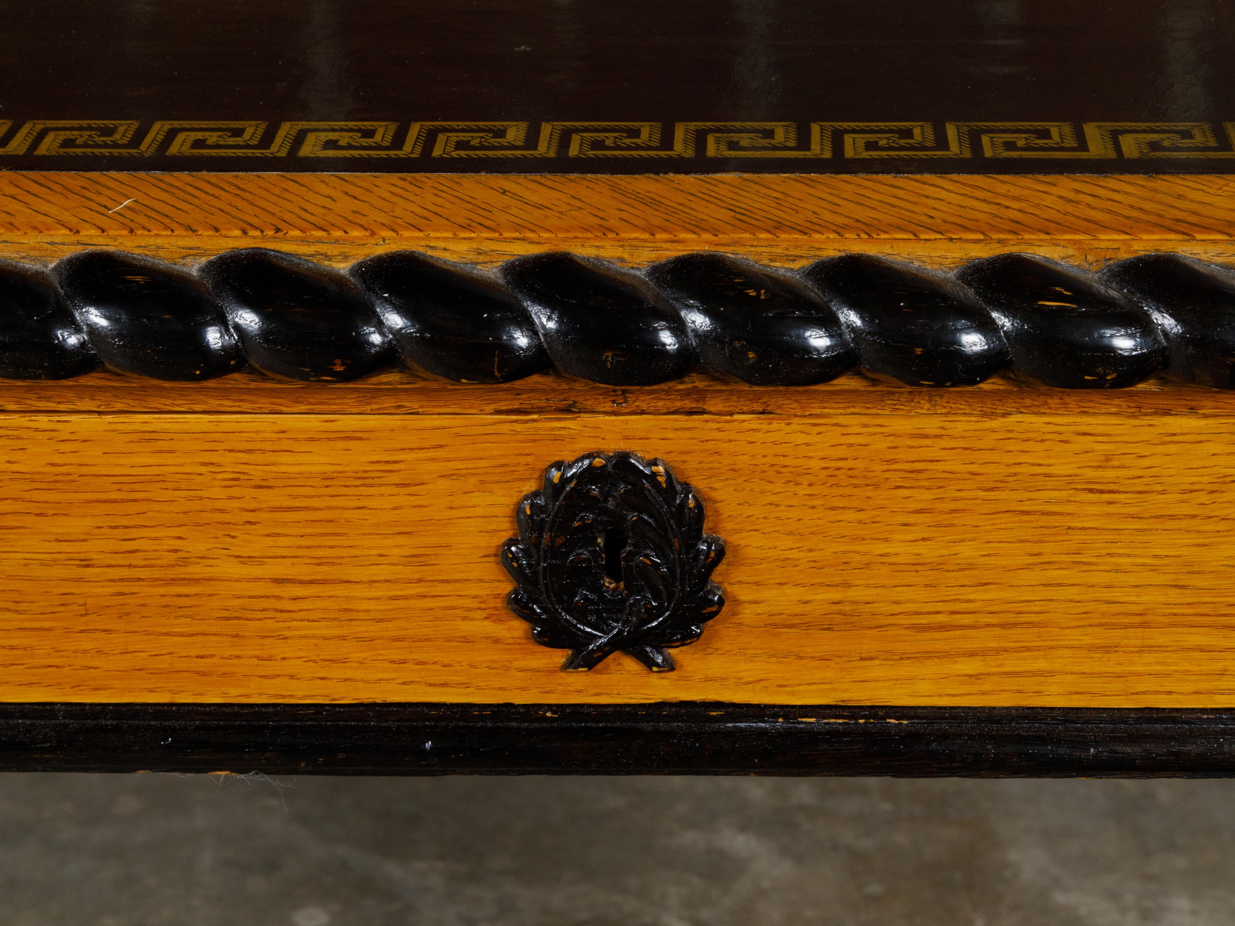 English 19th Century Oak Desk with Ebonized Accents and Gilded Greek Key Frieze For Sale 4