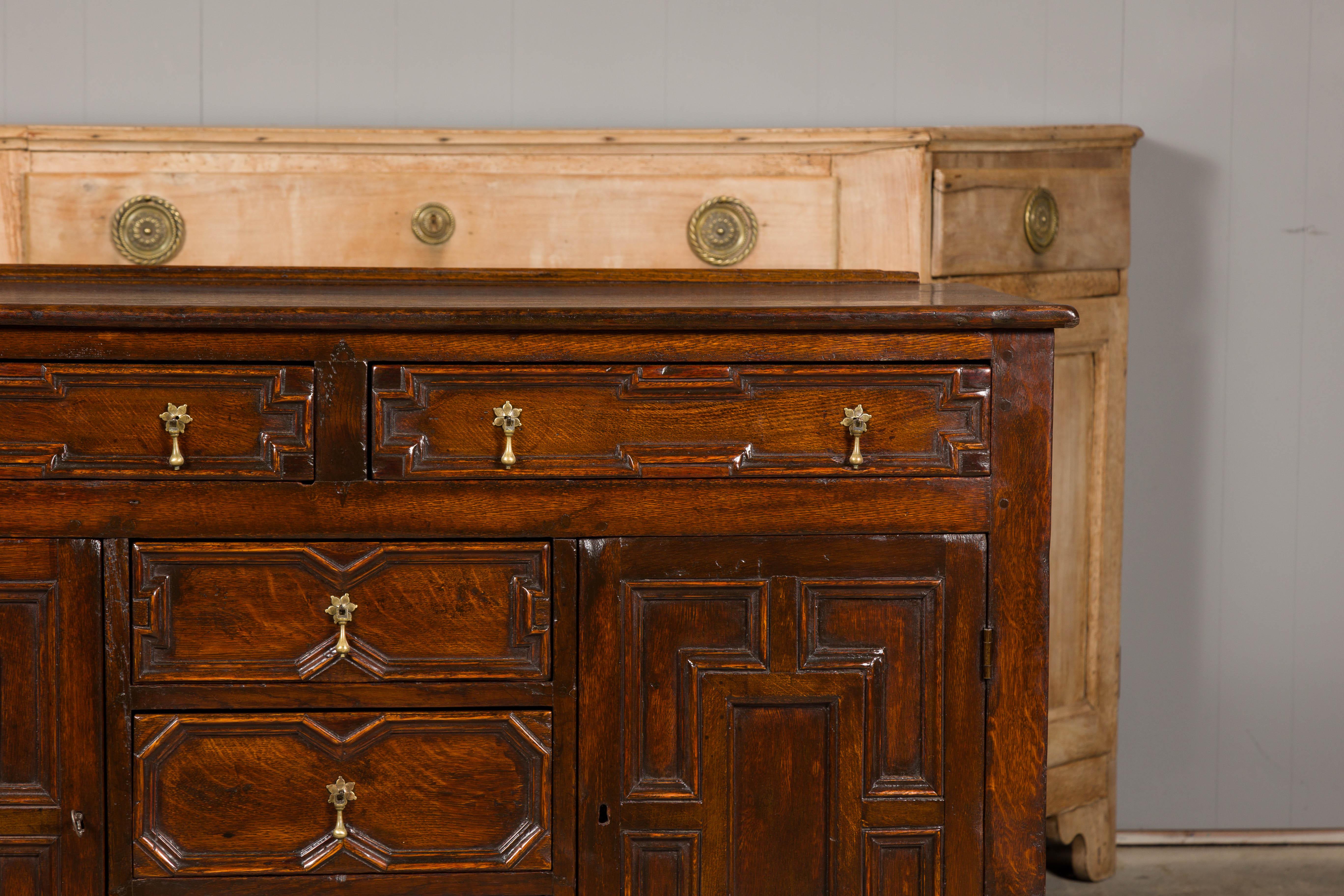 Carved English 19th Century Oak Dresser Base with Geometric Front, Drawers and Doors For Sale