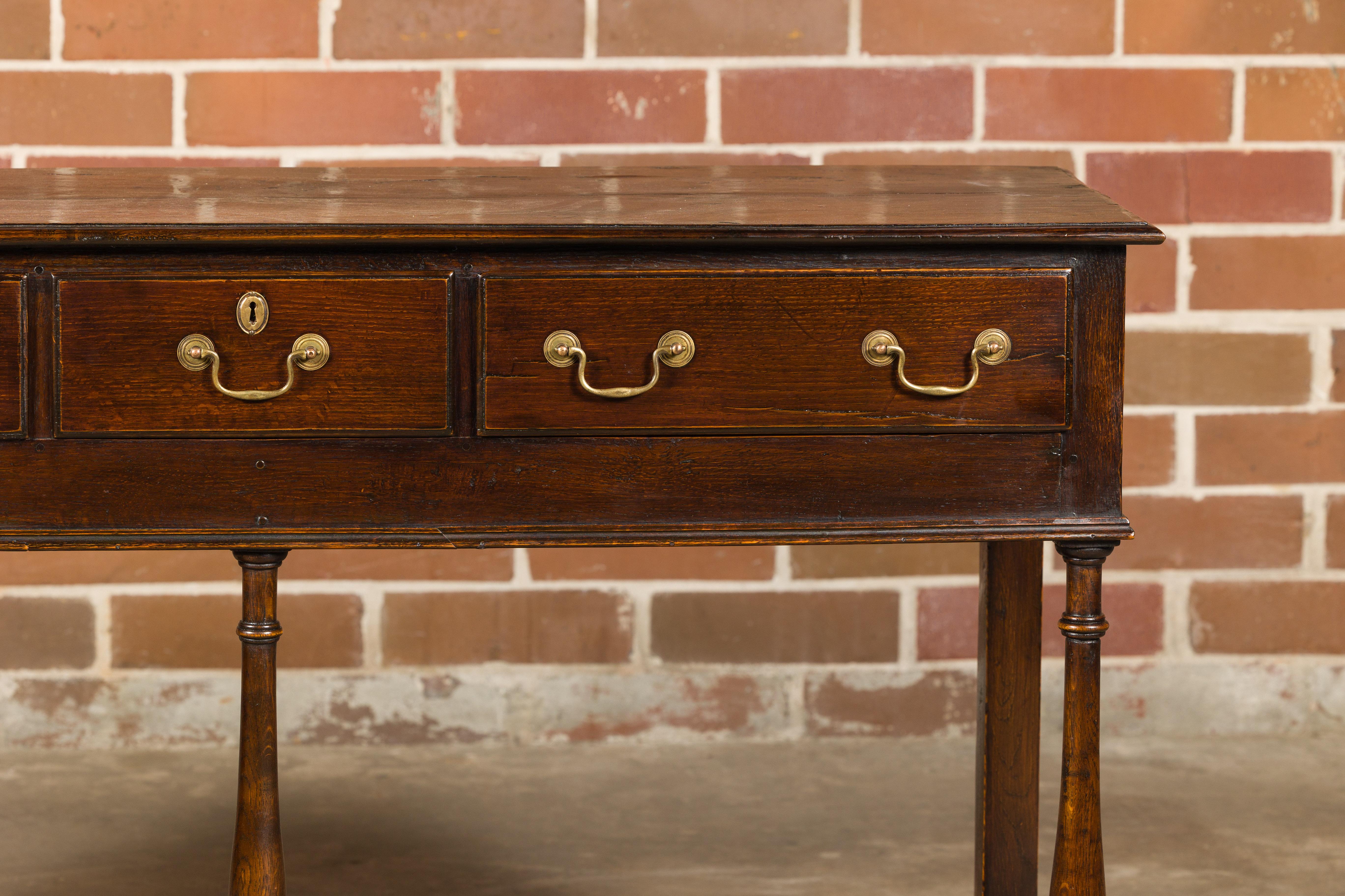 Brass English 19th Century Oak Dresser Base with Three Drawers and Baluster Legs For Sale