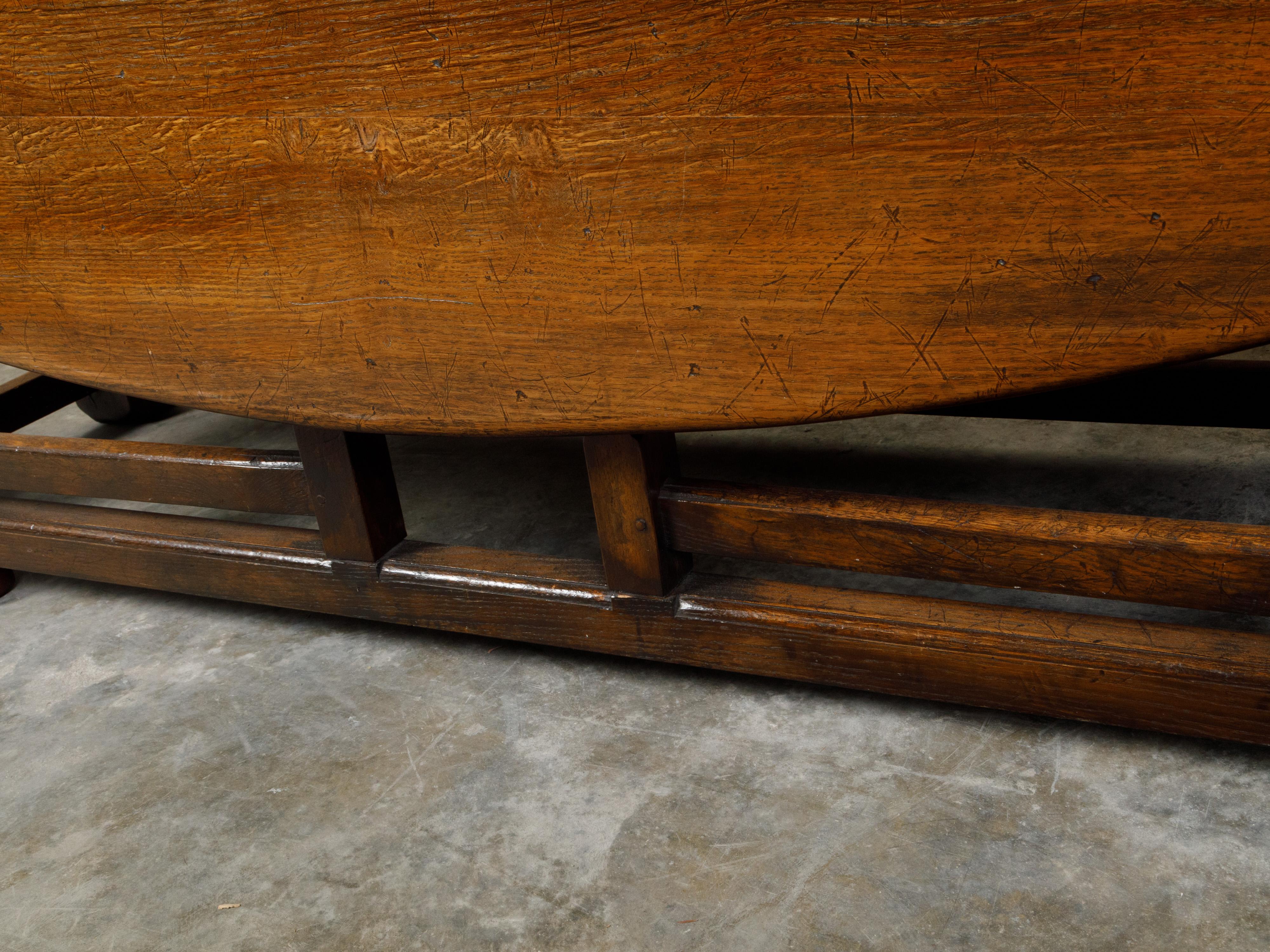 English 19th Century Oak Drop-Leaf Oval Top Table with Gateleg Base 7
