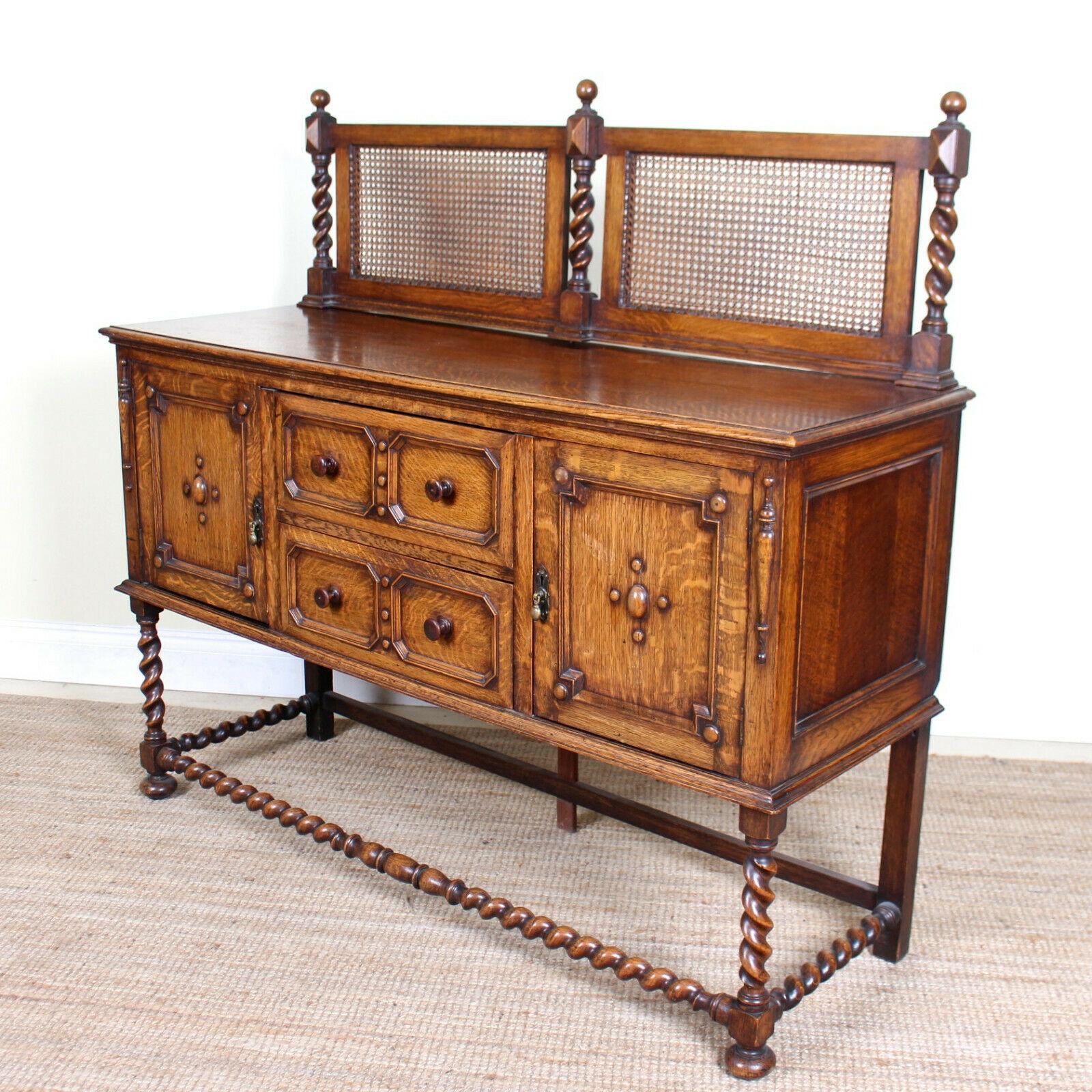 An fine quality 19th century sideboard in the Arts & Crafts manner.
Constructed from solid oak boasting a rich honey patina and well figured wild grain and boasting impressive carvings throughout with chamfered edges.
A carved bergere paneled