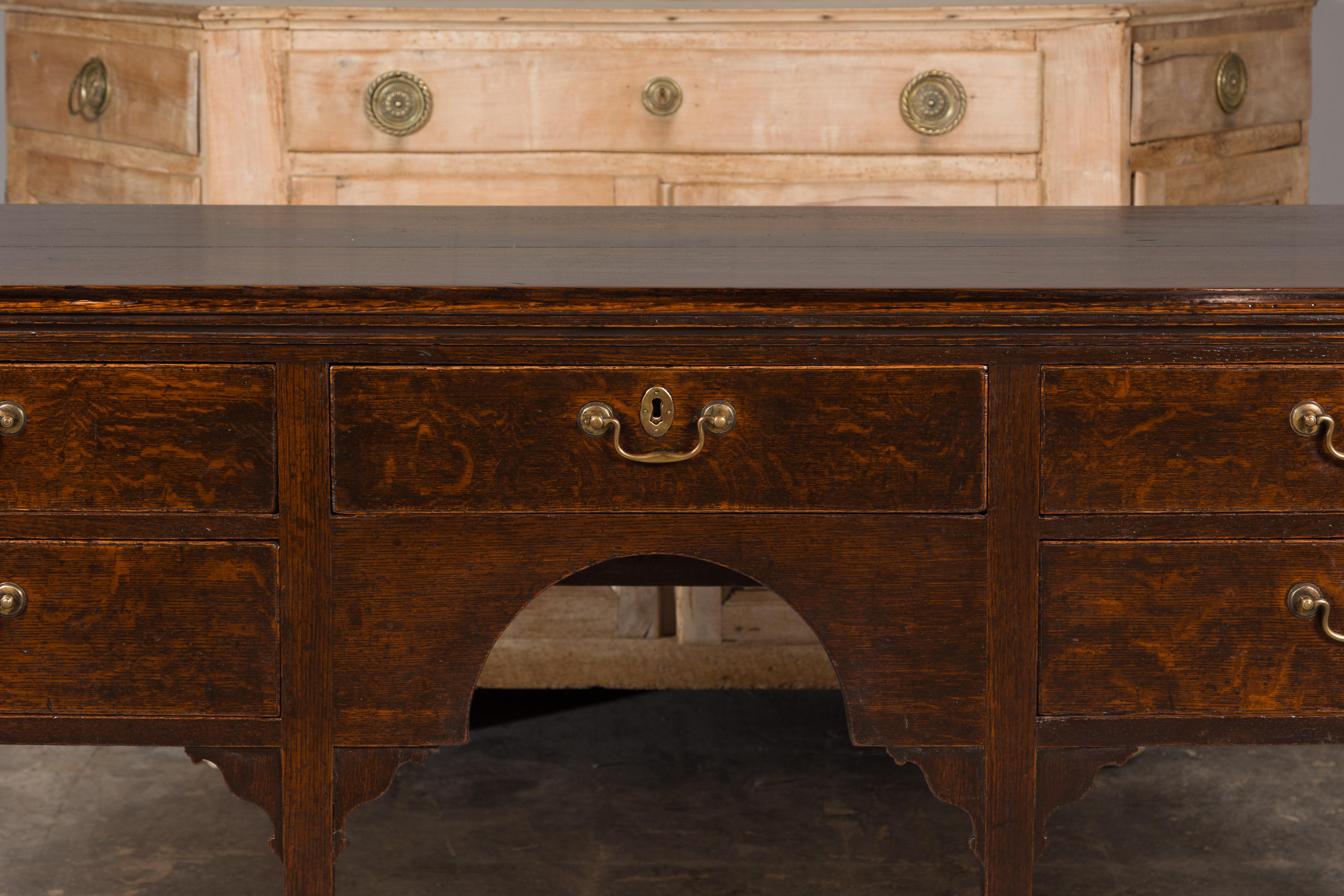 Brass English 19th Century Oak Sideboard with Five Drawers and Carved Spandrels For Sale