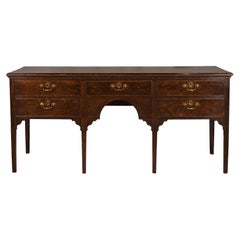 English 19th Century Oak Sideboard with Five Drawers and Carved Spandrels