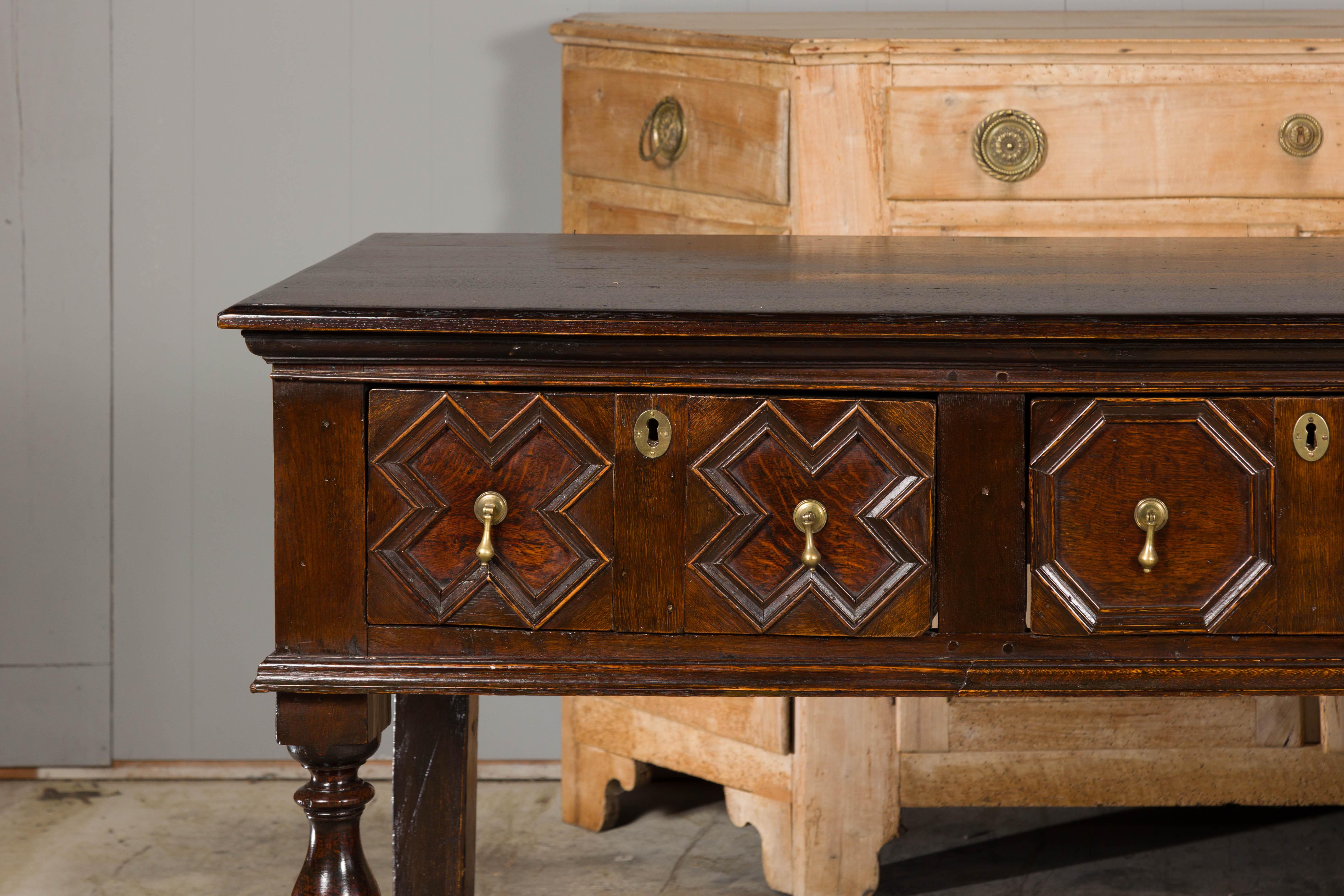 Carved English 19th Century Oak Sideboard with Geometric Front and Three Drawers For Sale