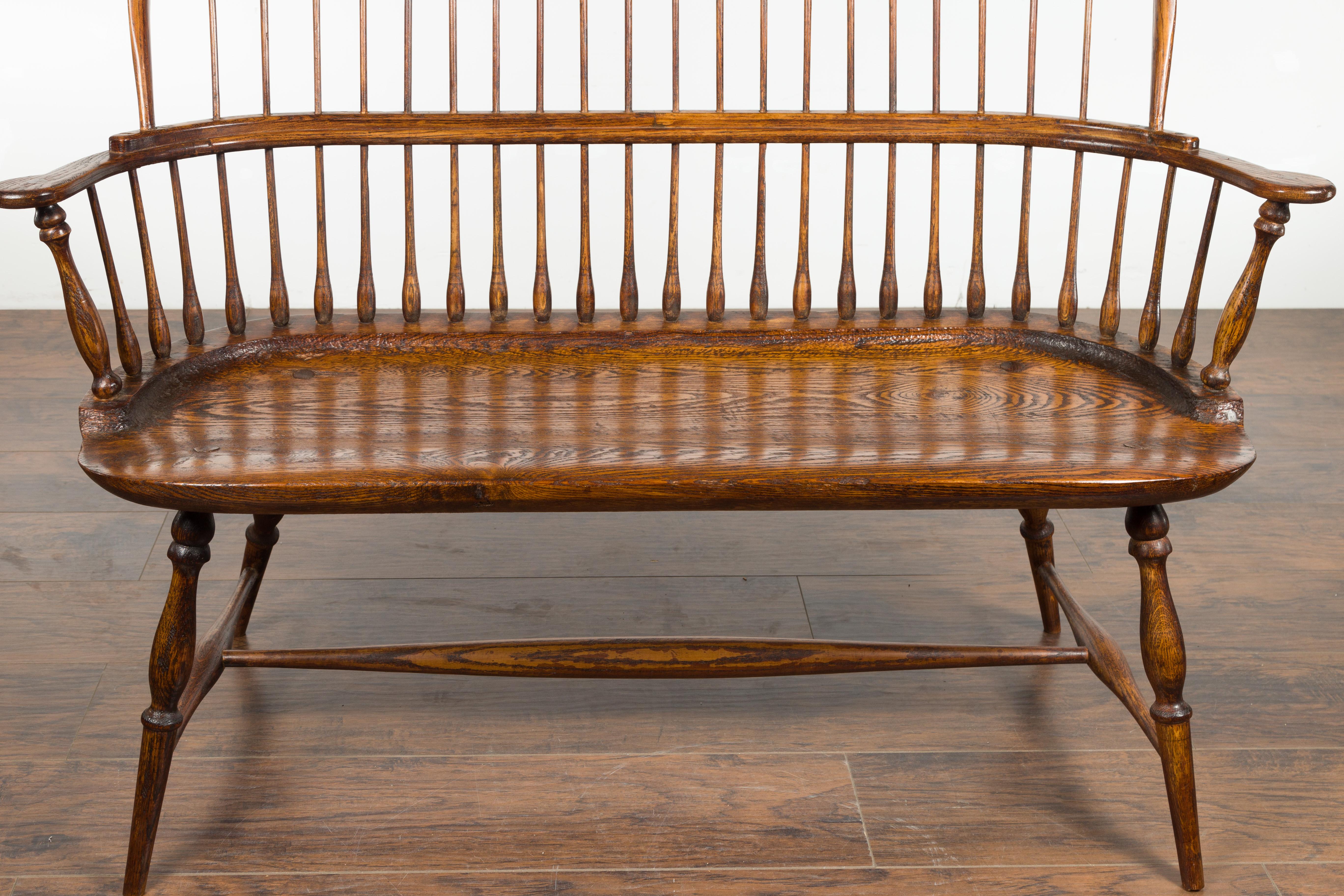 English 19th Century Oak Windsor Bench with Spindle Accents and Cross Stretcher 6
