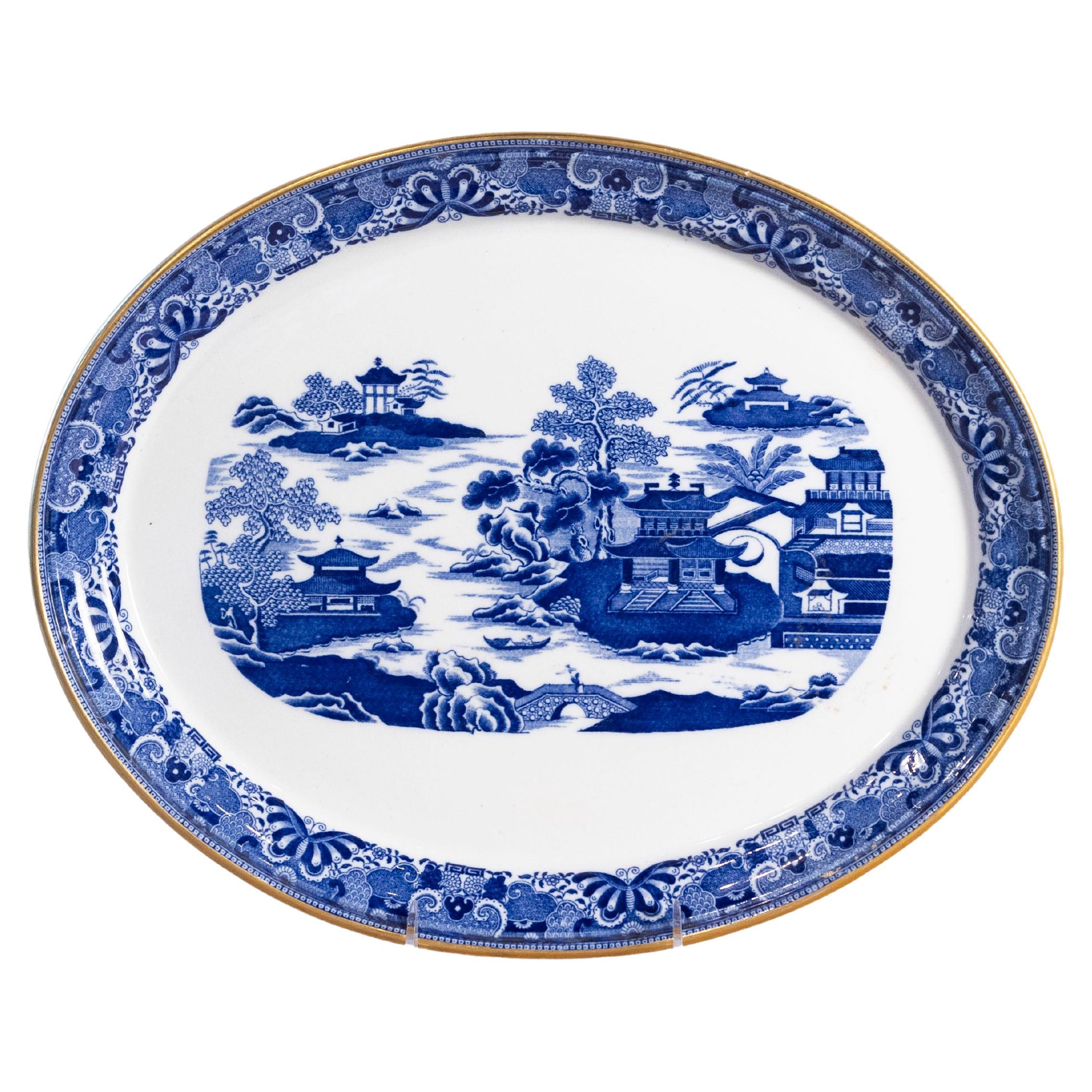 English 19th Century Oval Blue and White Porcelain Platter with Chinoiseries