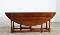 English 19th Century Oval Drop-leaf Table
