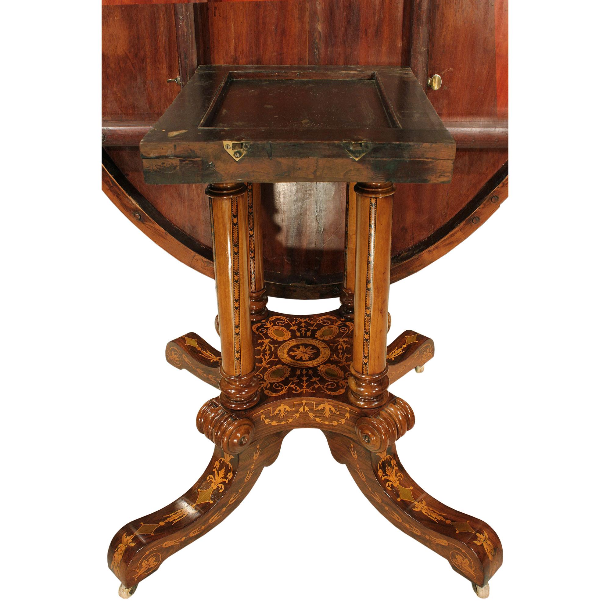 English 19th century oval tilt top center table in walnut and exoticwoods 1
