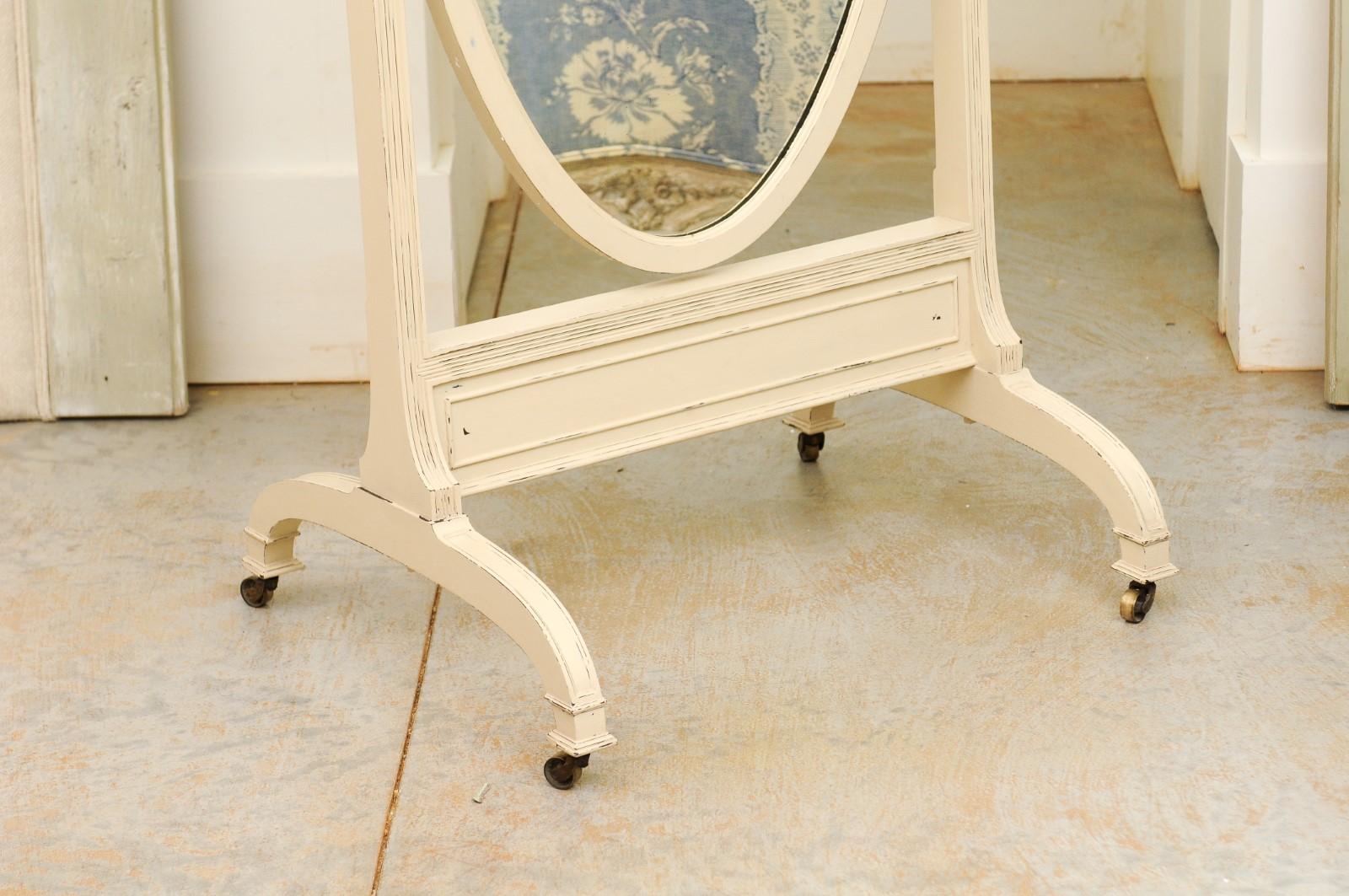 English 19th Century Painted Wood Cheval Mirror with Oval Plate and Casters For Sale 1