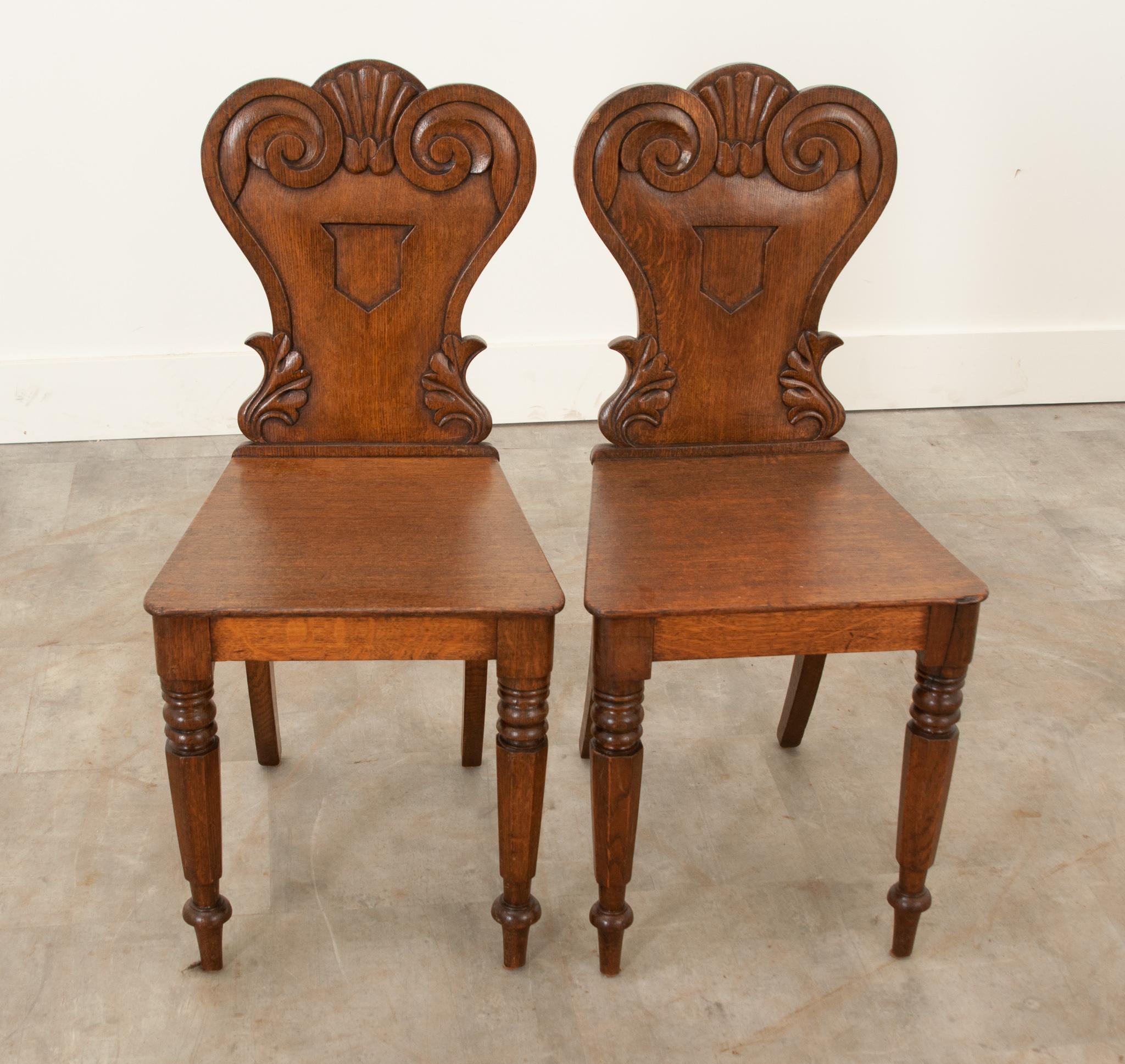 Polished English 19th Century Pair of Oak Hall Chairs For Sale