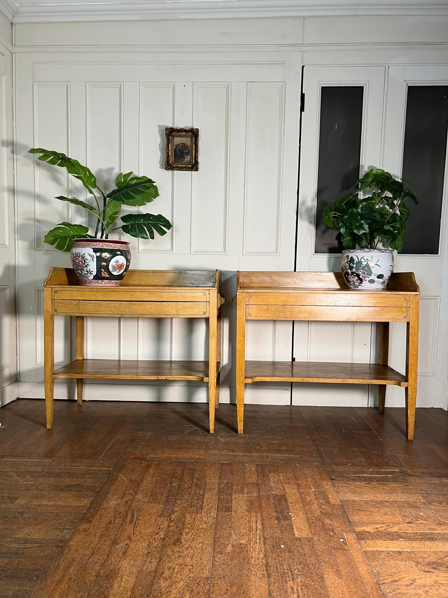 Nice pair of scumble painted pine wash stands with under drawers and lower shelf.

Good size for dressing tables or desks.

Stripped work top.

Some marking to shelves as shown.

English 19th century.

Price is for the pair.