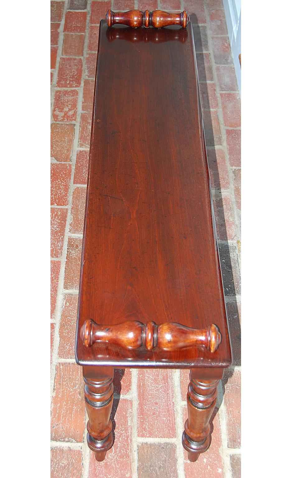English 19th century period mahogany hall bench four feet long with turned legs and roll ends, 47 Inches long and 11