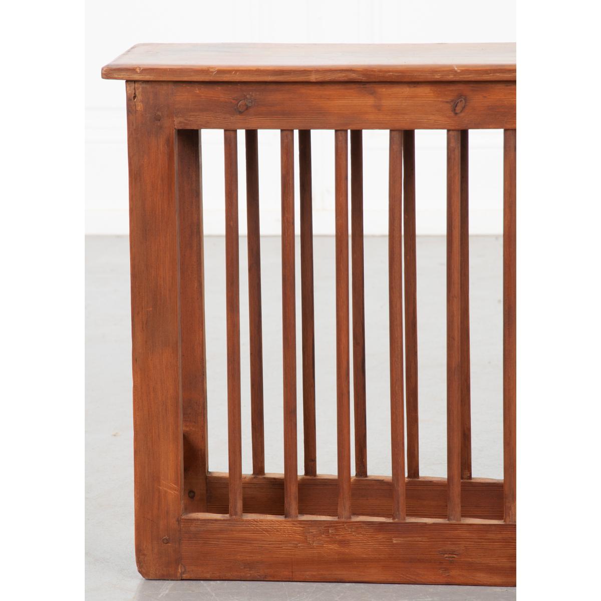 This simple wooden plate holder is the functional piece of antique organization you’ve been searching for. You’ll have a much easier time accessing, storing, and drying your plates with this piece. The wood itself is in great condition and level so