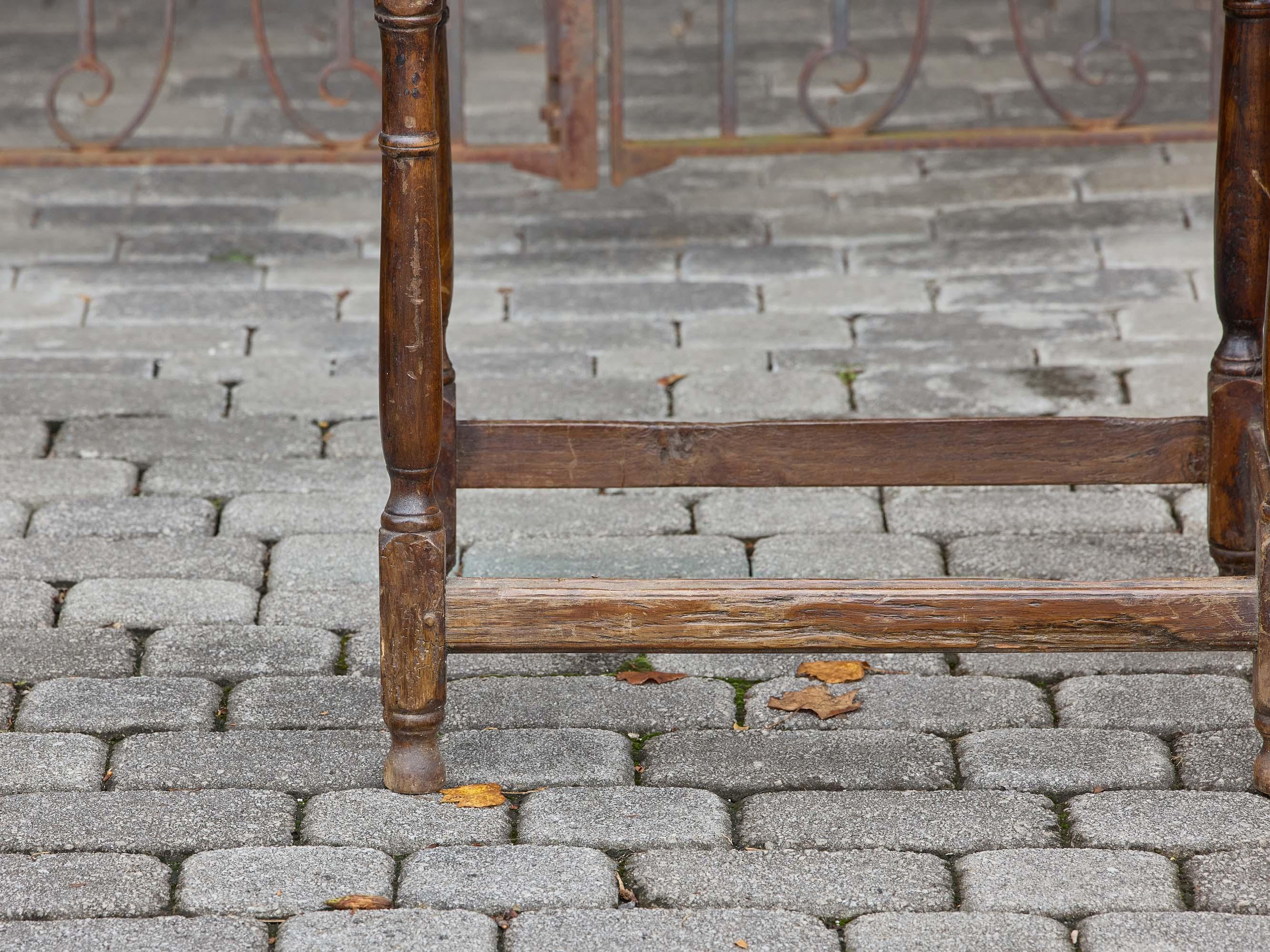 English 19th Century Rustic Elm Table with Drawer and Stretcher Base For Sale 6