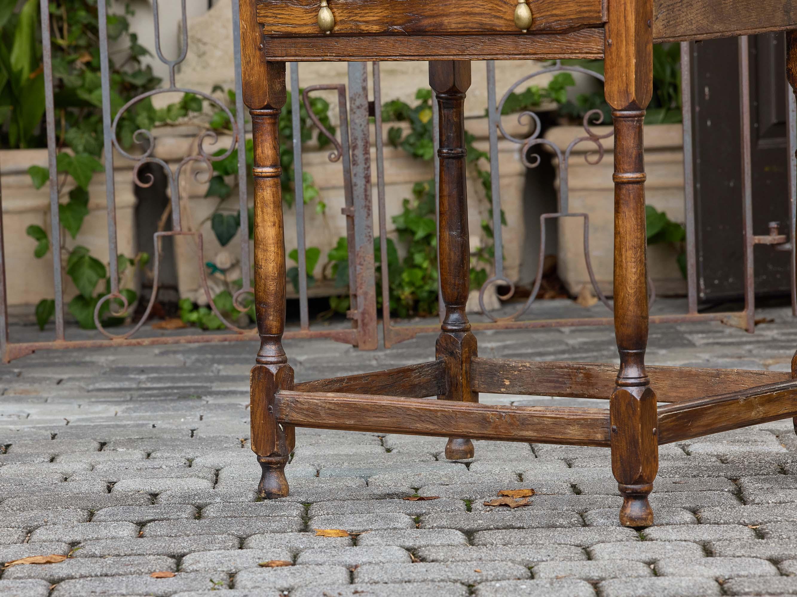 Brass English 19th Century Rustic Elm Table with Drawer and Stretcher Base For Sale