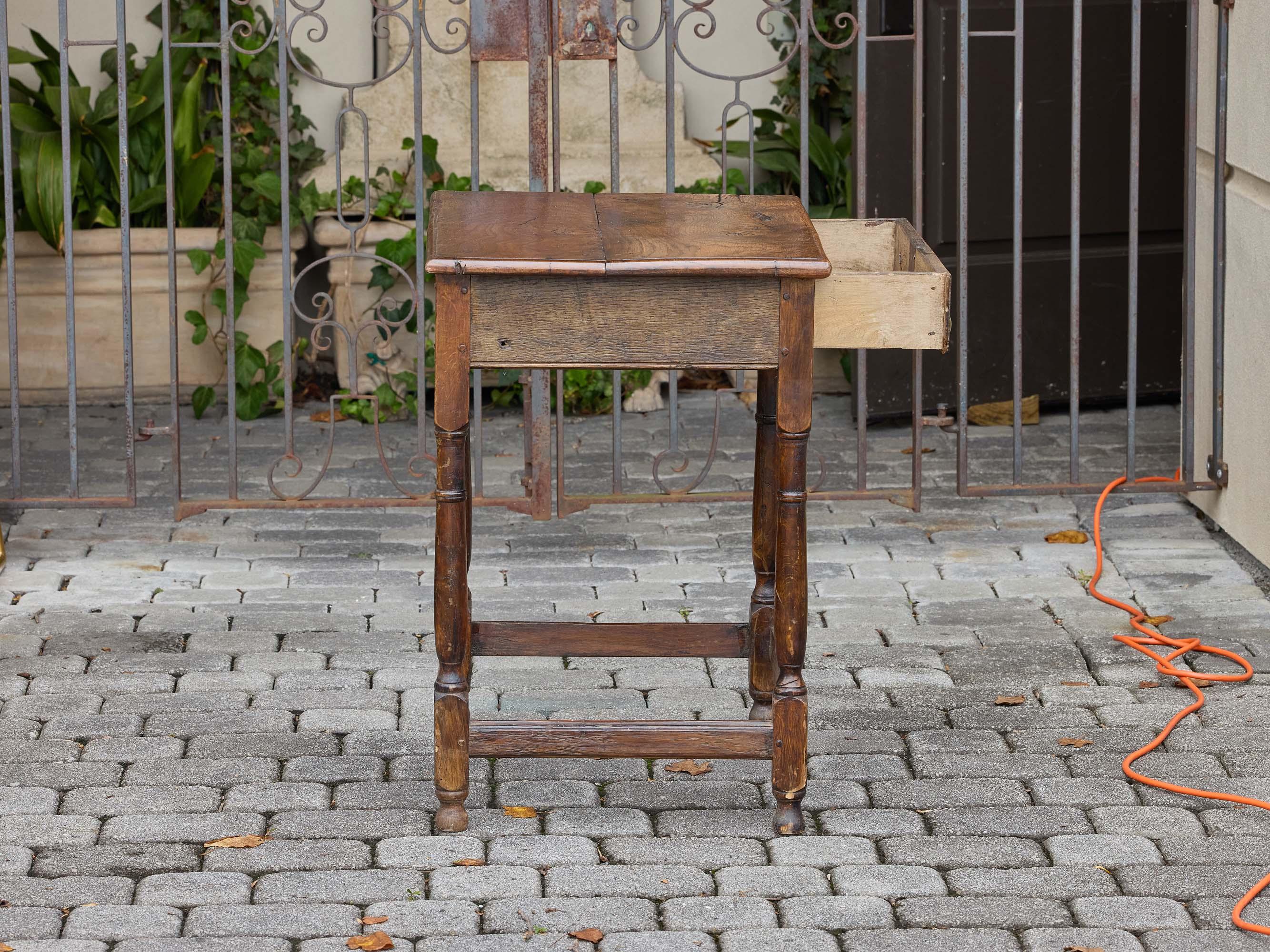 English 19th Century Rustic Elm Table with Drawer and Stretcher Base For Sale 4