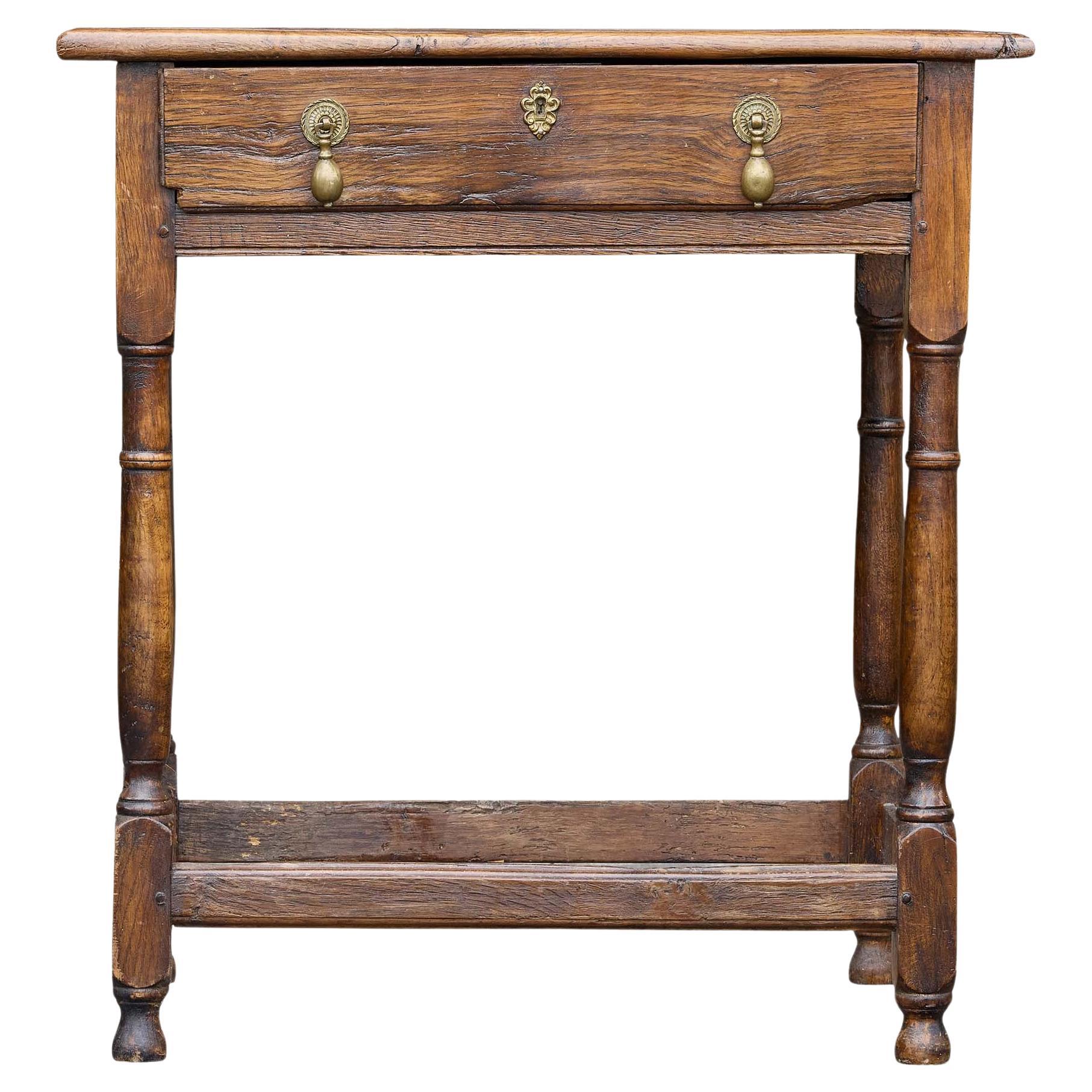 English 19th Century Rustic Elm Table with Drawer and Stretcher Base For Sale